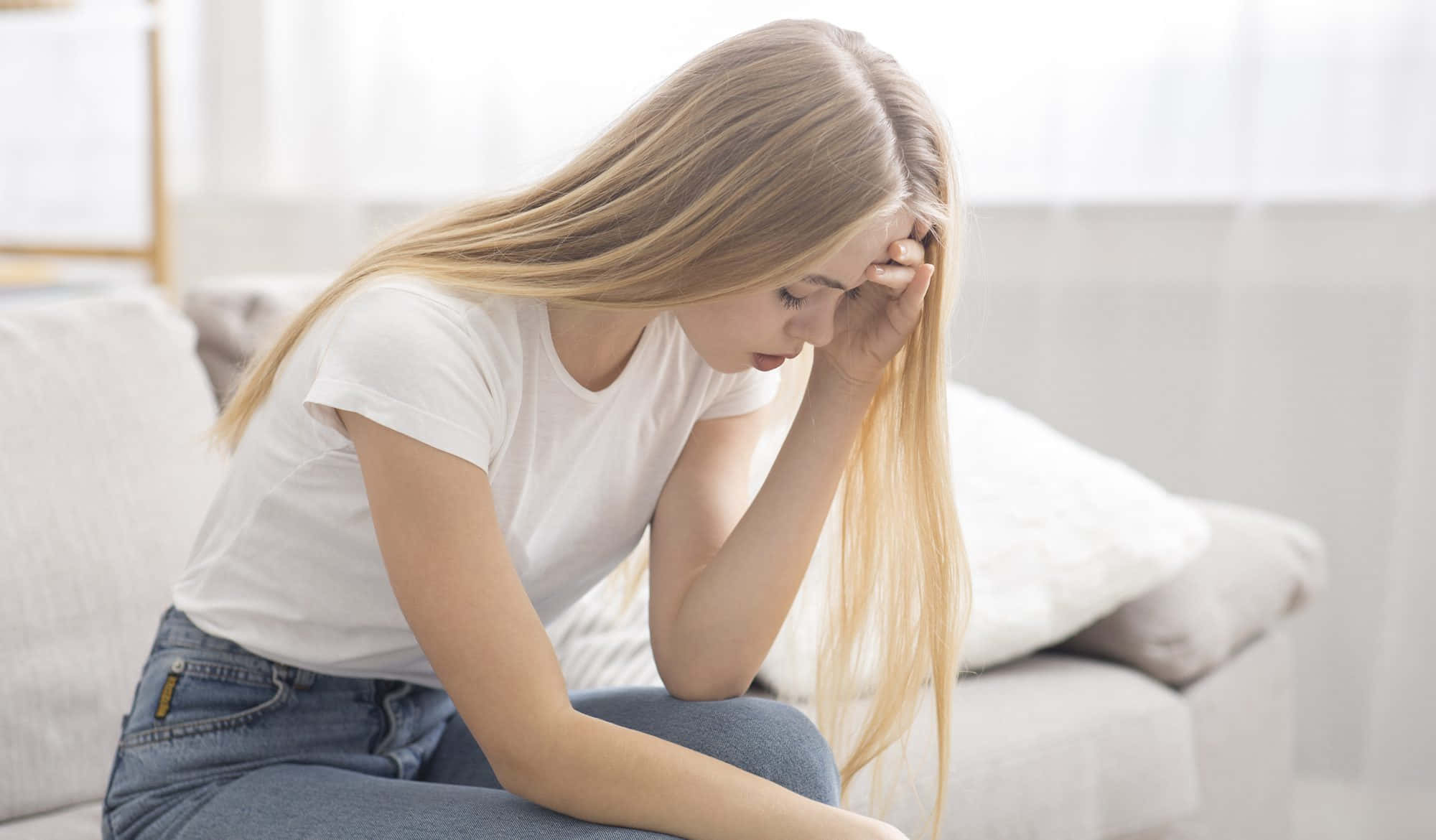 cute aesthetic teenage girl, long blonde hair, slumped on a couch, Full HD Desktop Wallpaper