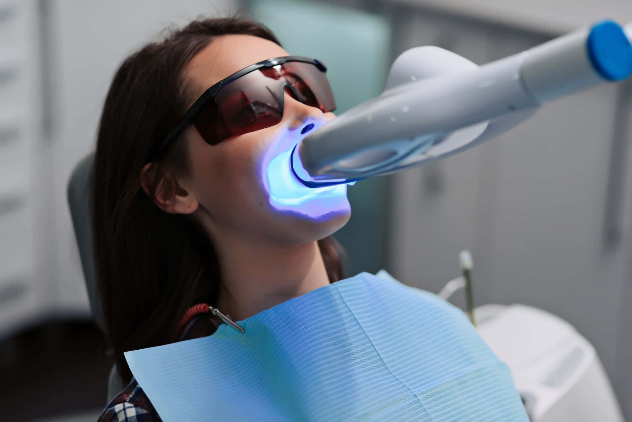 Teeth Whitening, bright blue light, clinical setting, Full HD Desktop Wallpaper