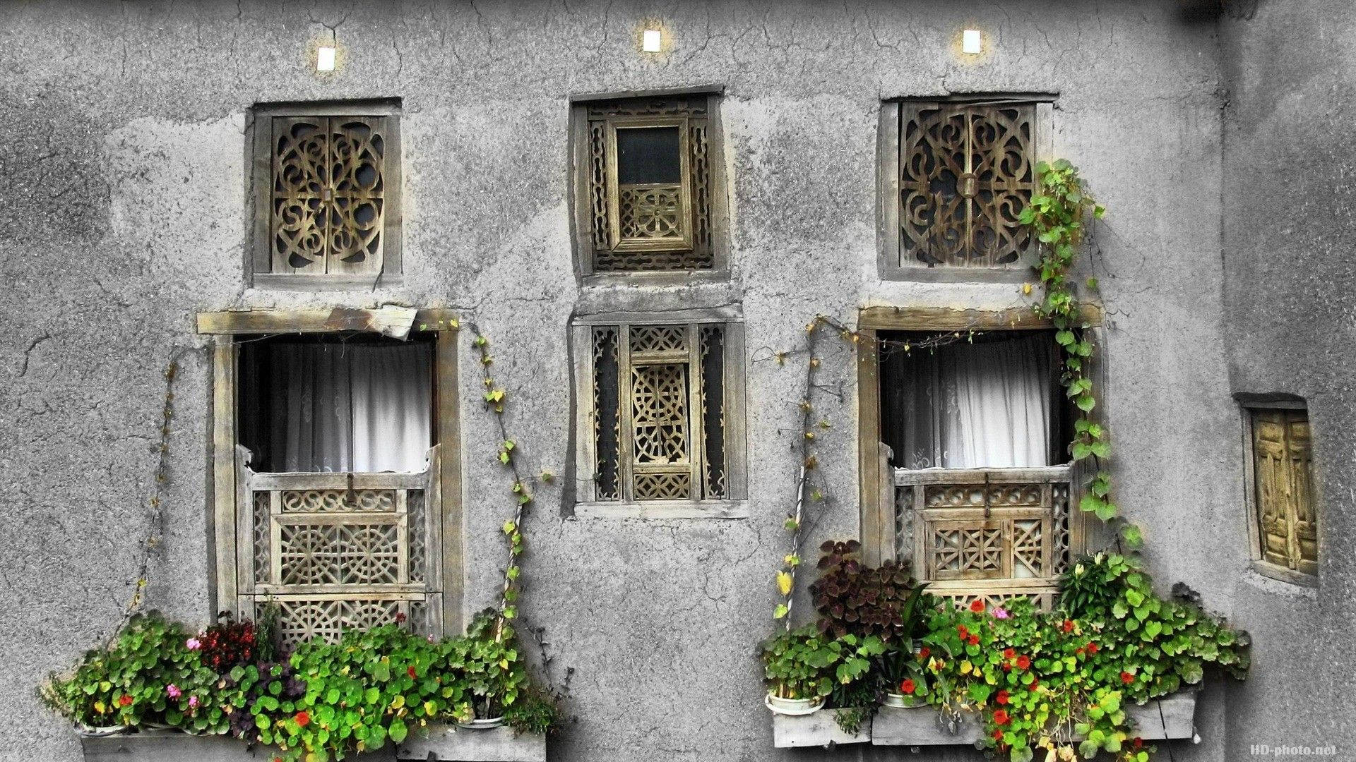 Tehran, weathered gray stone wall, ornate wooden windows, Full HD Desktop Wallpaper