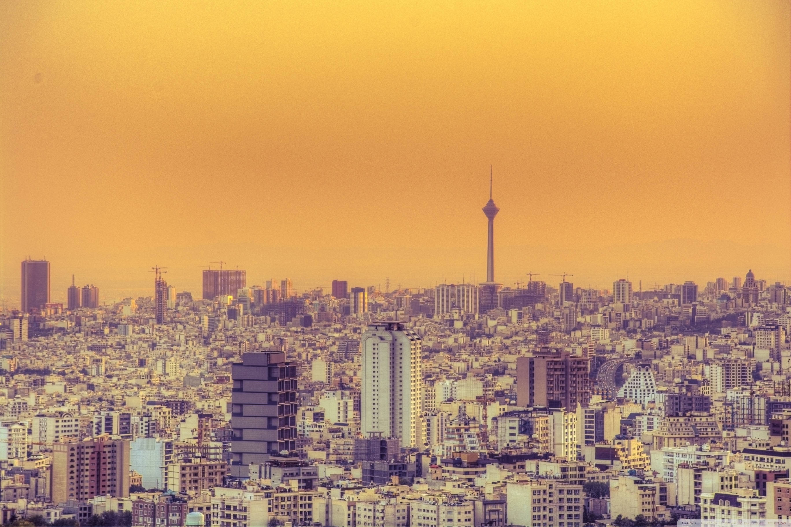 Tehran, yellow sky, golden sunset light, 2K Desktop Wallpaper