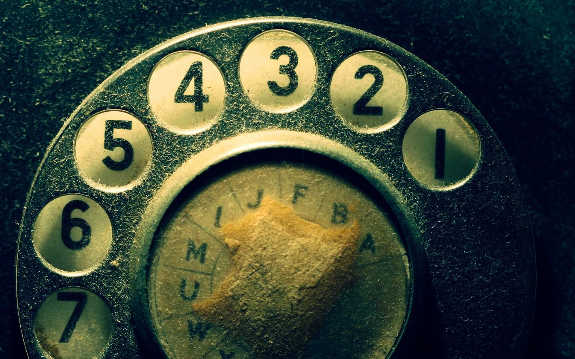 rotary phone dial, worn numbers and letters, warm sepia lighting, Full HD Desktop Wallpaper