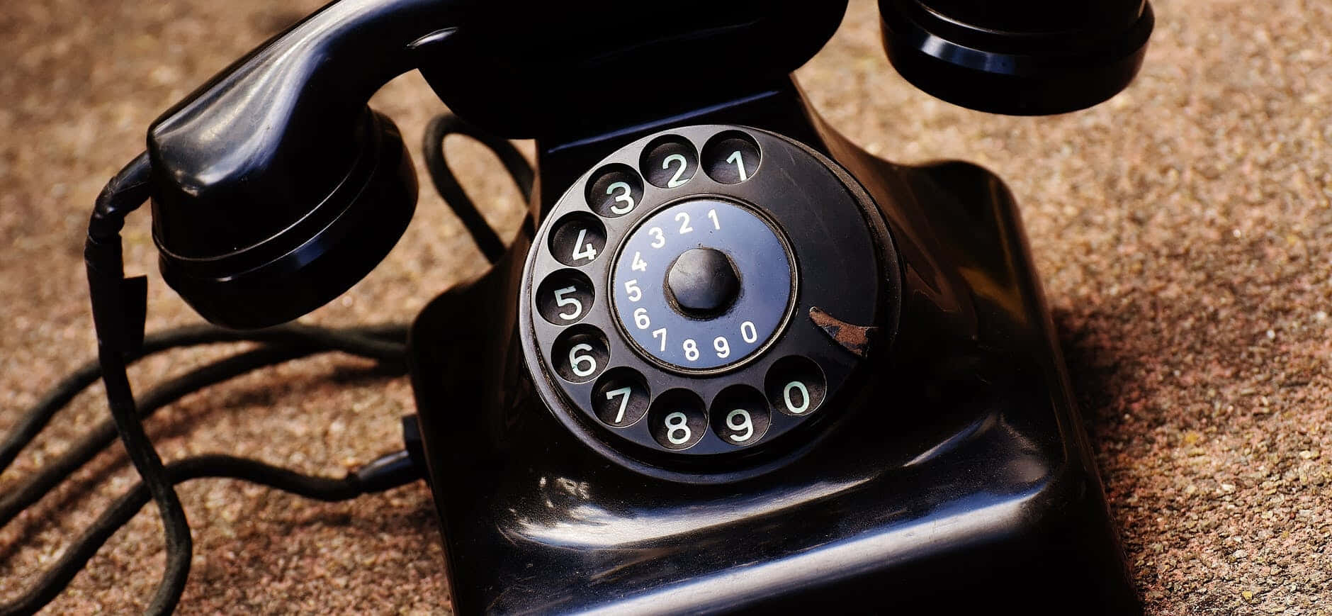 vintage black rotary telephone, textured brown surface, coiled cord, HD Desktop Wallpaper