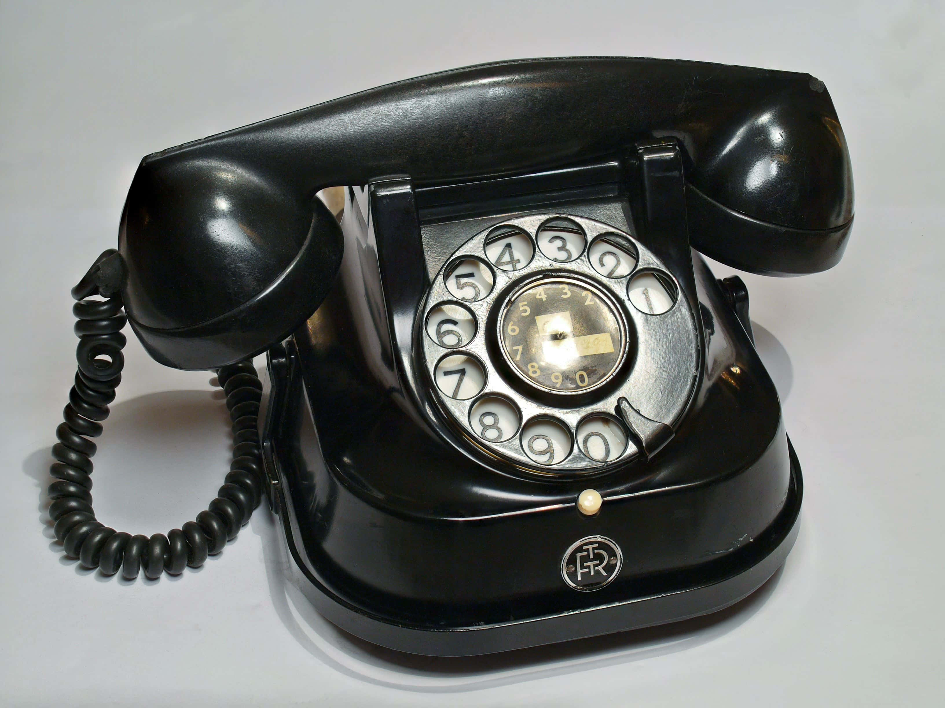 vintage rotary telephone, glossy black, silver dial, 2K Desktop Wallpaper