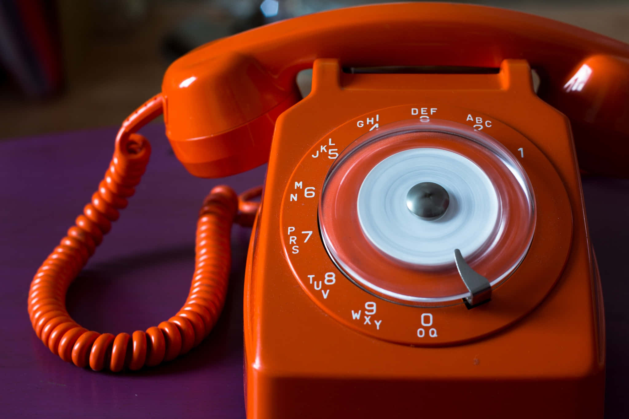 vintage orange rotary phone, coiled cord, purple surface, Full HD Desktop Wallpaper
