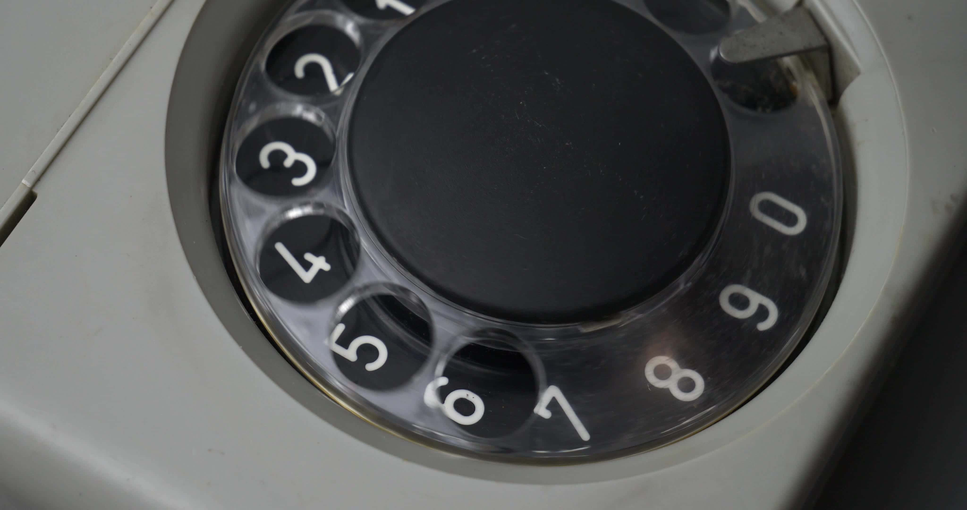 vintage rotary phone dial, worn numbers, dusty black center, 4K Desktop Wallpaper