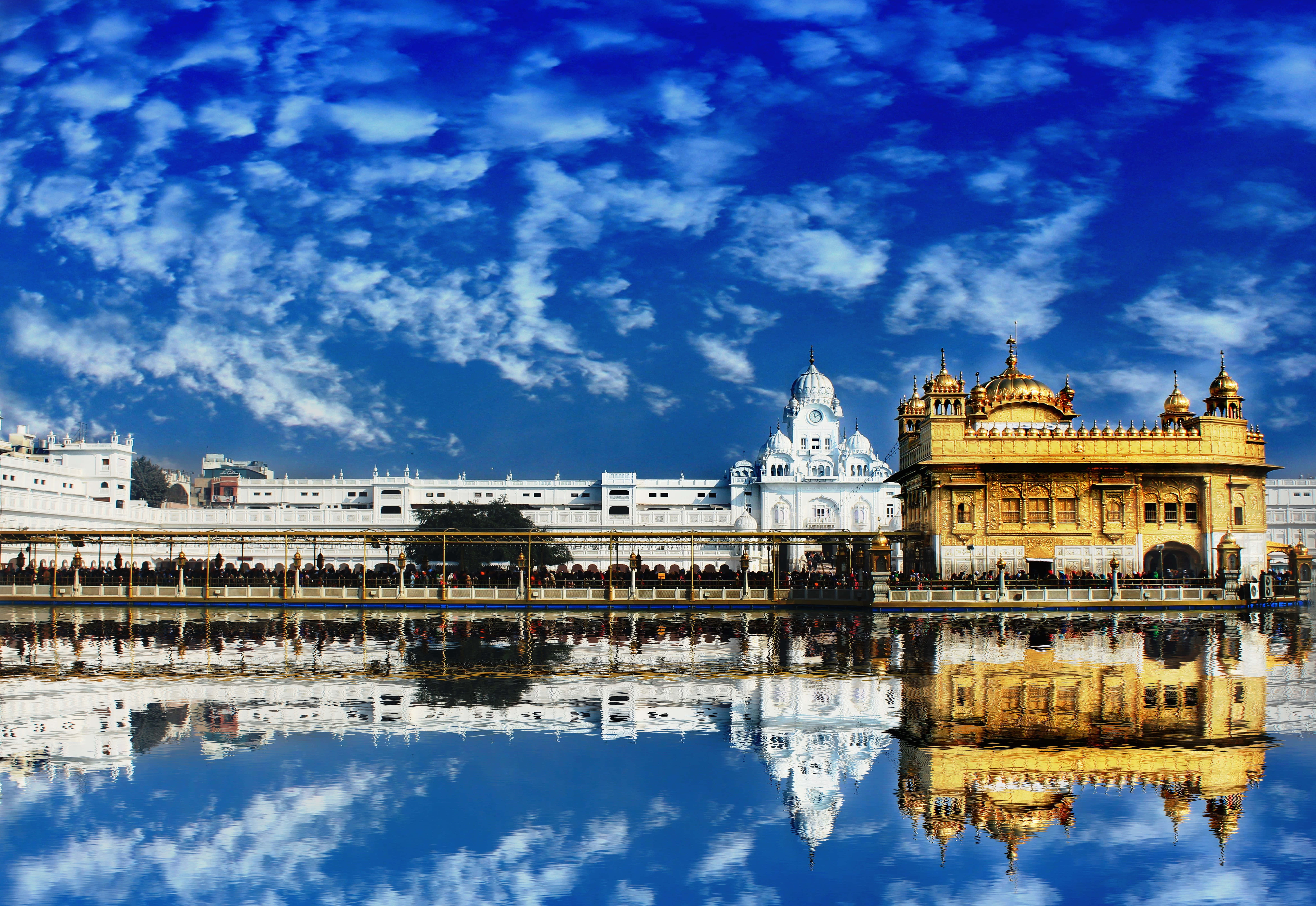Golden Temple, bright blue sky, fluffy clouds, 8K Desktop Wallpaper