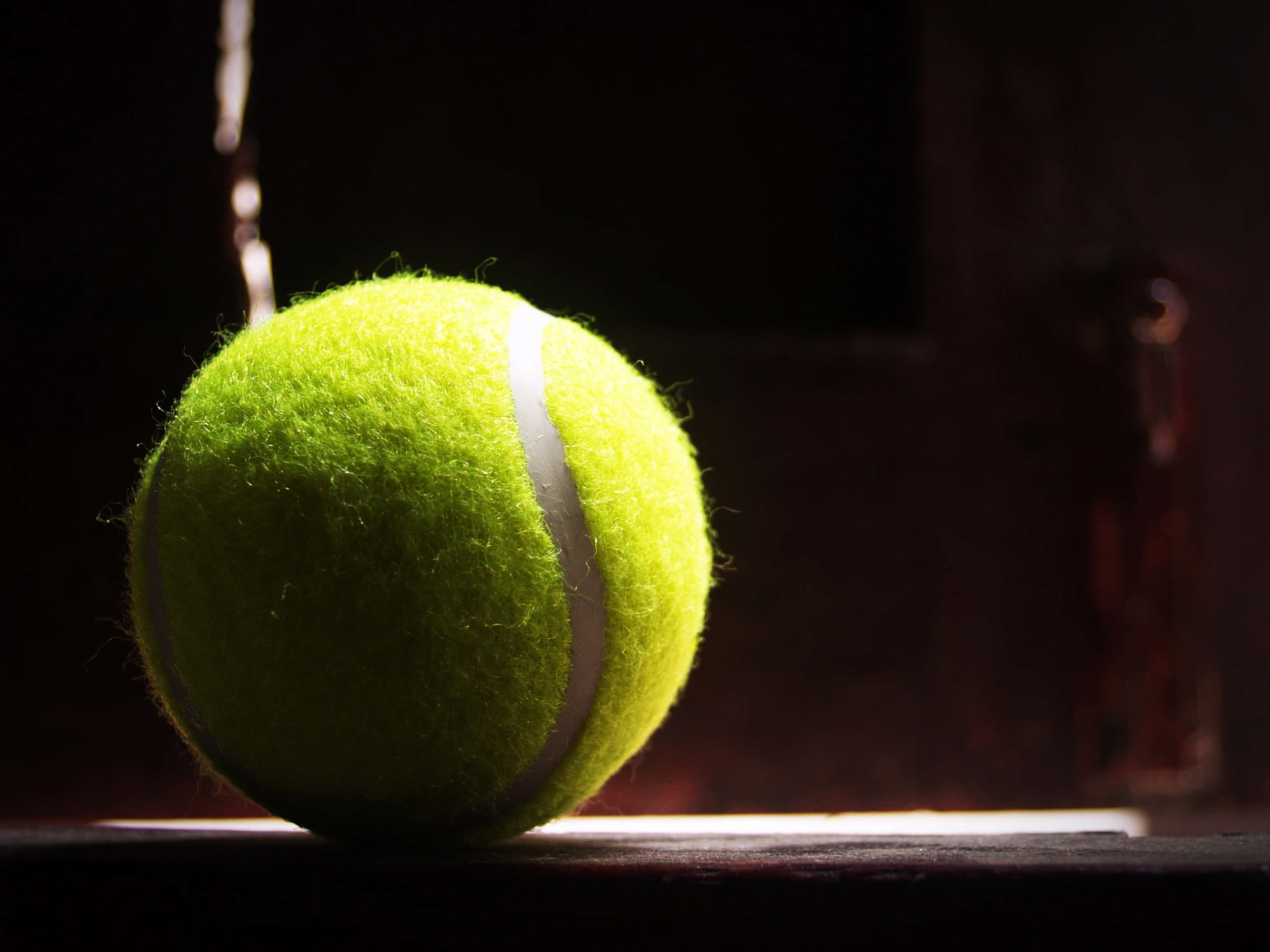 tennis ball, bright yellow, dark surface, 2K Desktop Wallpaper