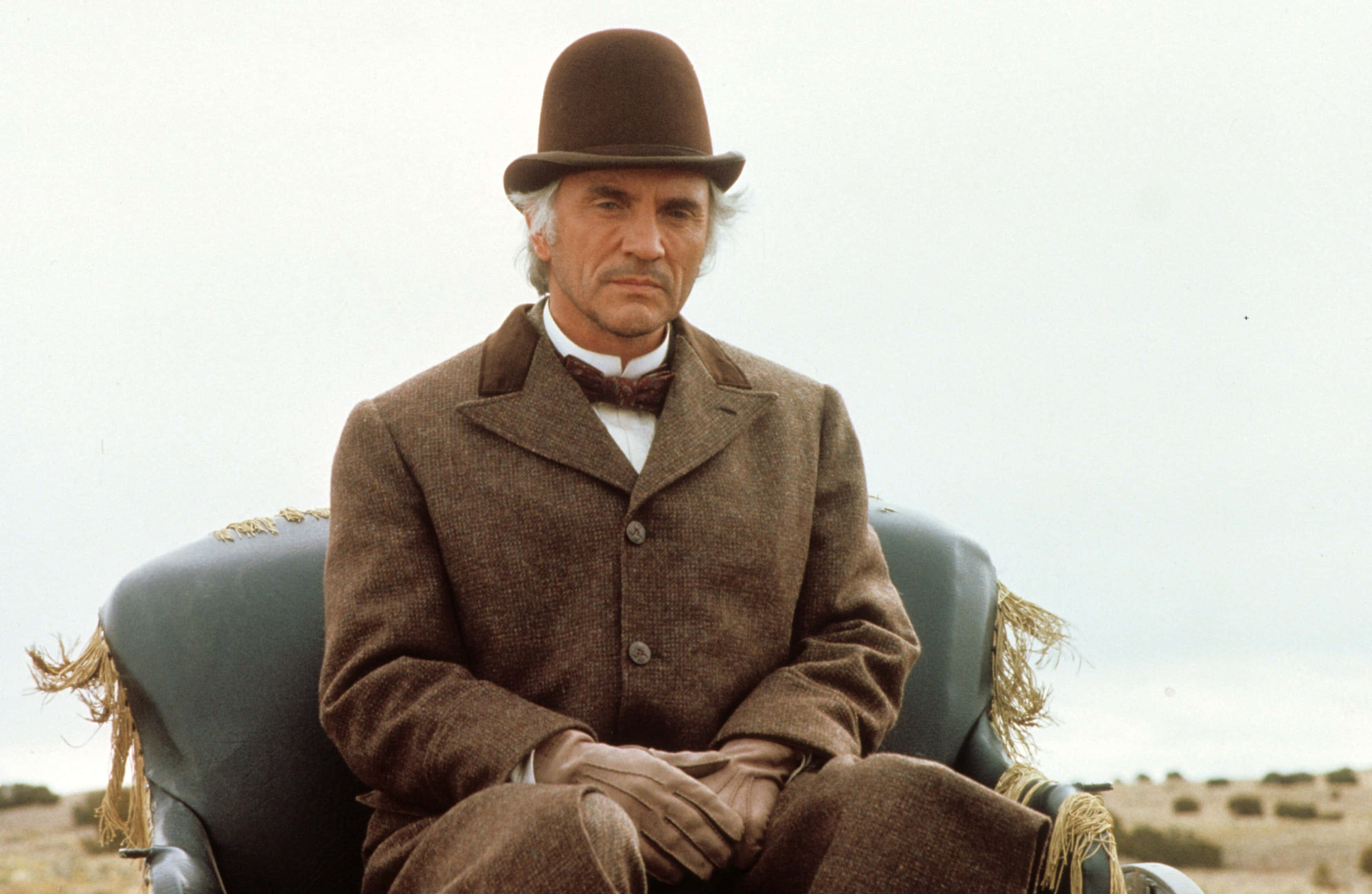 Terence Stamp, brown bowler hat, matching suit, 2K Desktop Wallpaper