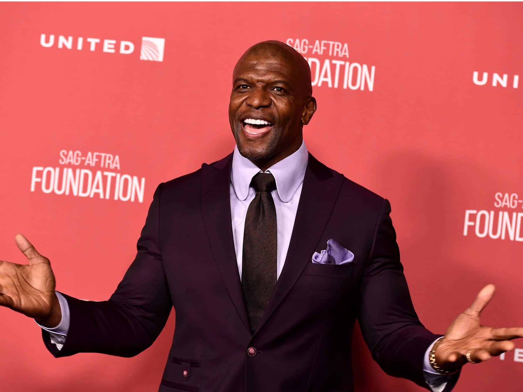Terry Crews, dark suit, red branded backdrop, HD Desktop Wallpaper