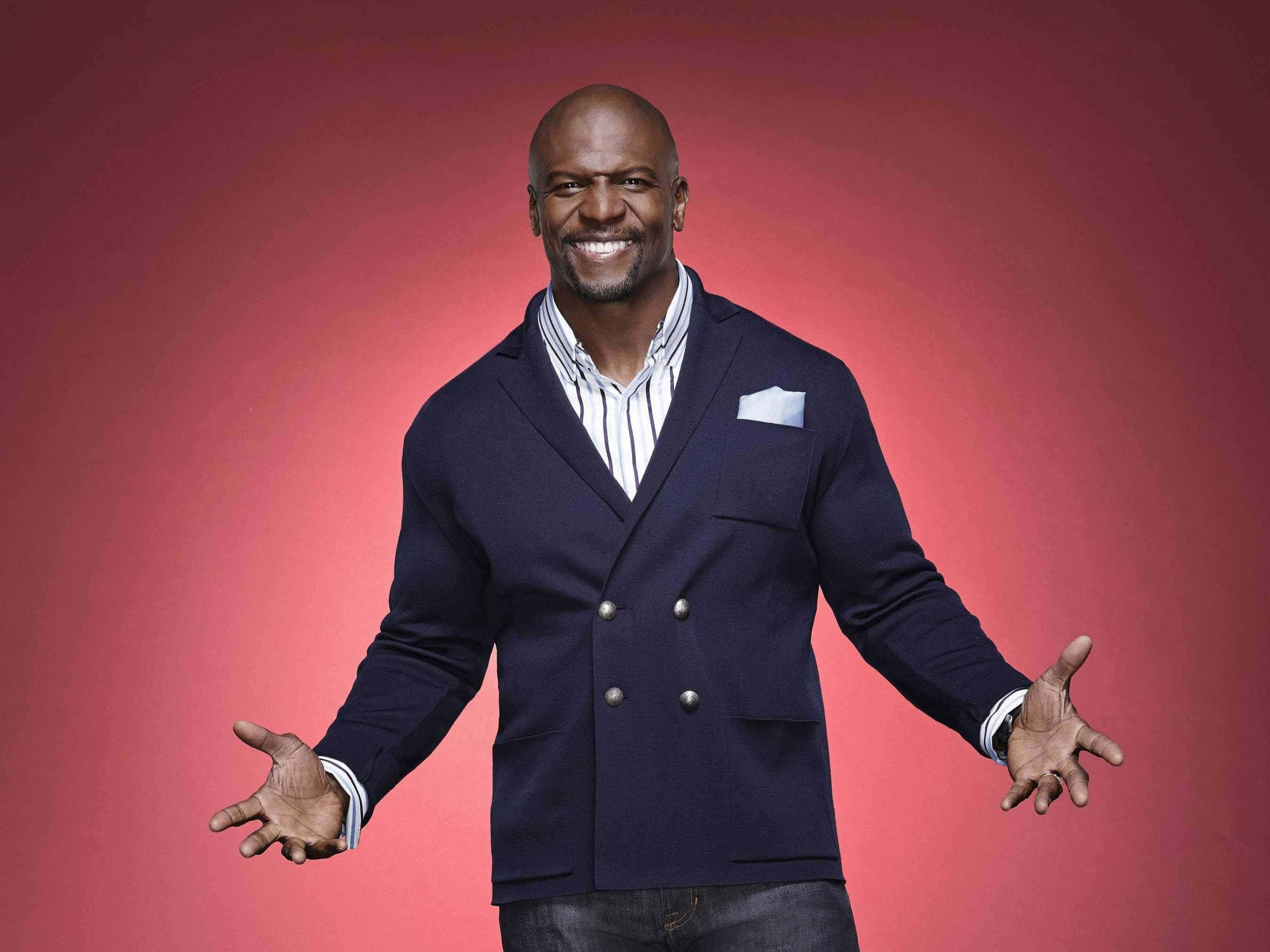 Terry Crews, navy blazer, gradient red background, 2K Desktop Wallpaper