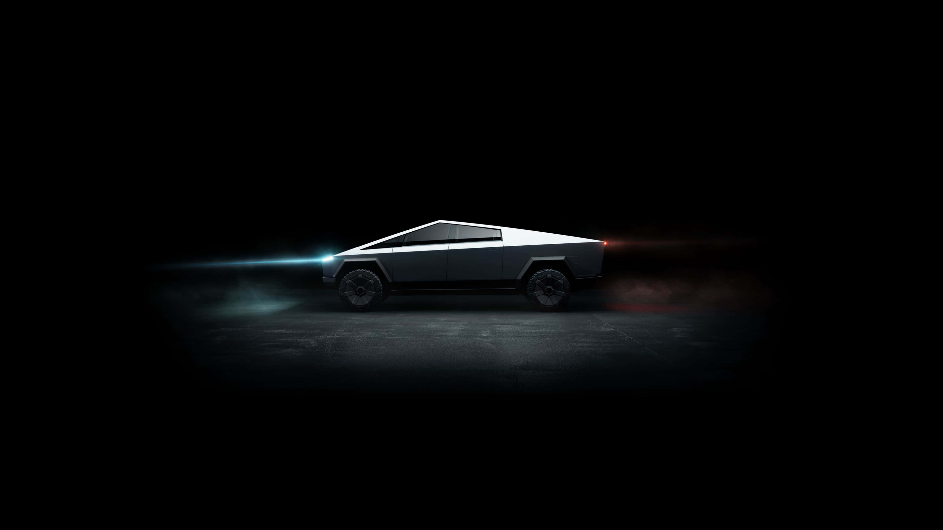 Tesla Cybertruck, glowing blue headlights, red taillights, 4K Desktop Wallpaper
