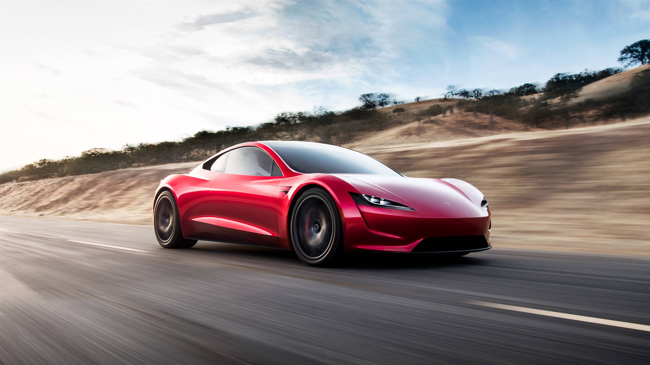 Tesla Roadster, red, desert highway, 2K Desktop Wallpaper