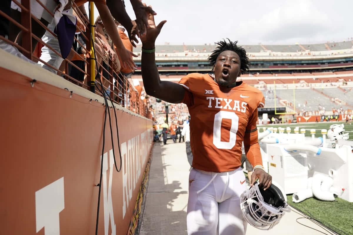 Texas football player, orange jersey, number zero, SD Desktop Wallpaper