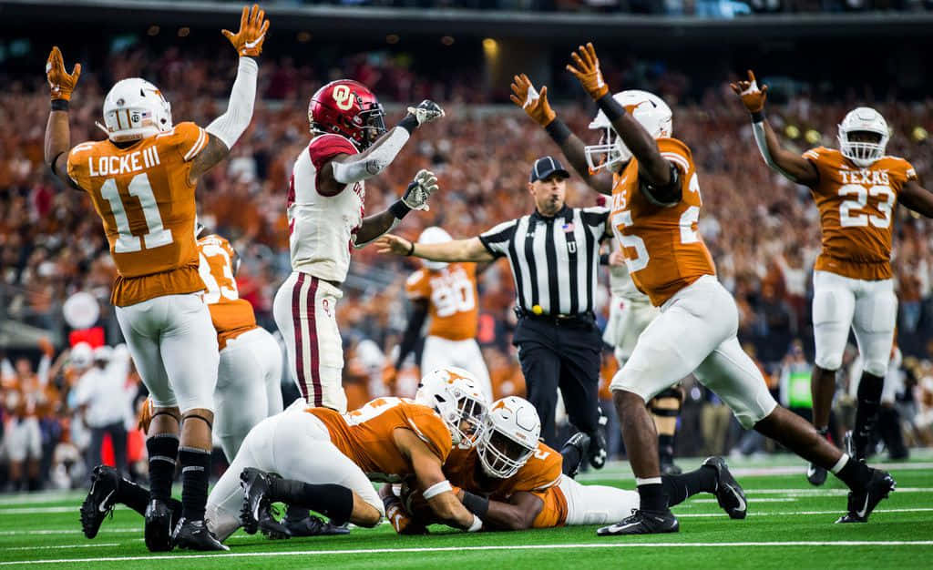 Texas Football, orange uniforms, vibrant green field, SD Desktop Wallpaper