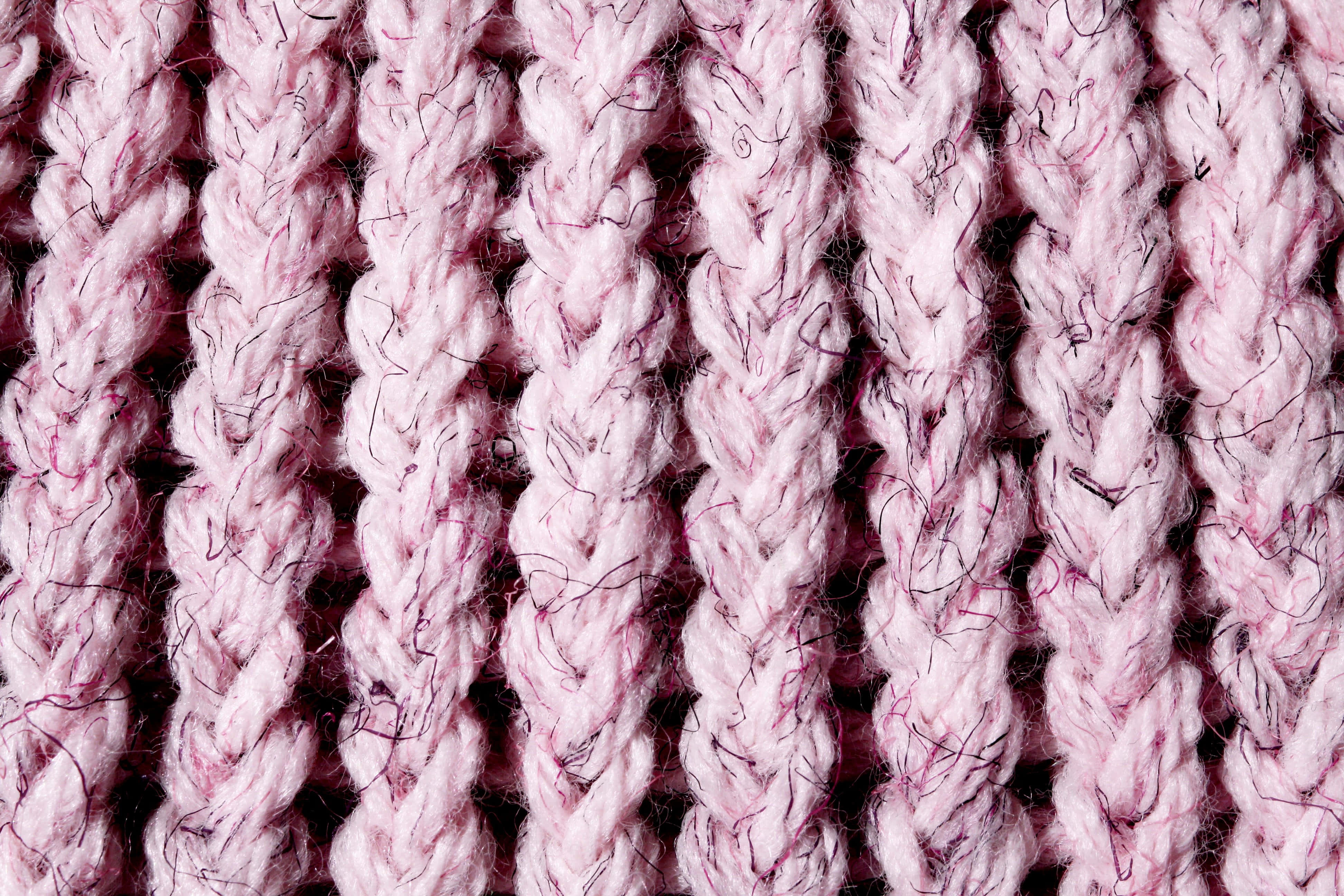soft pink knitted fabric, subtle dark fibers, textured stitches, 4K Desktop Wallpaper