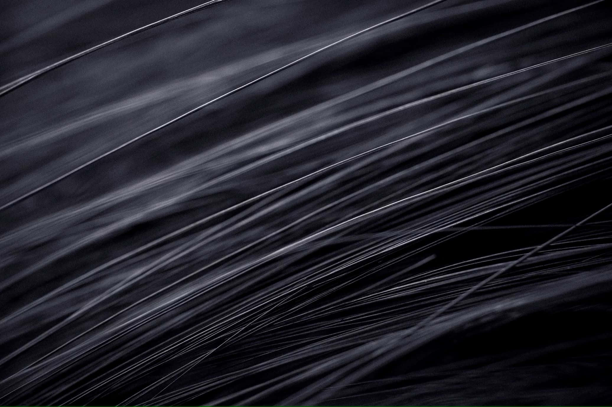 abstract black hair texture, dark flowing strands, subtle highlights, Full HD Desktop Wallpaper