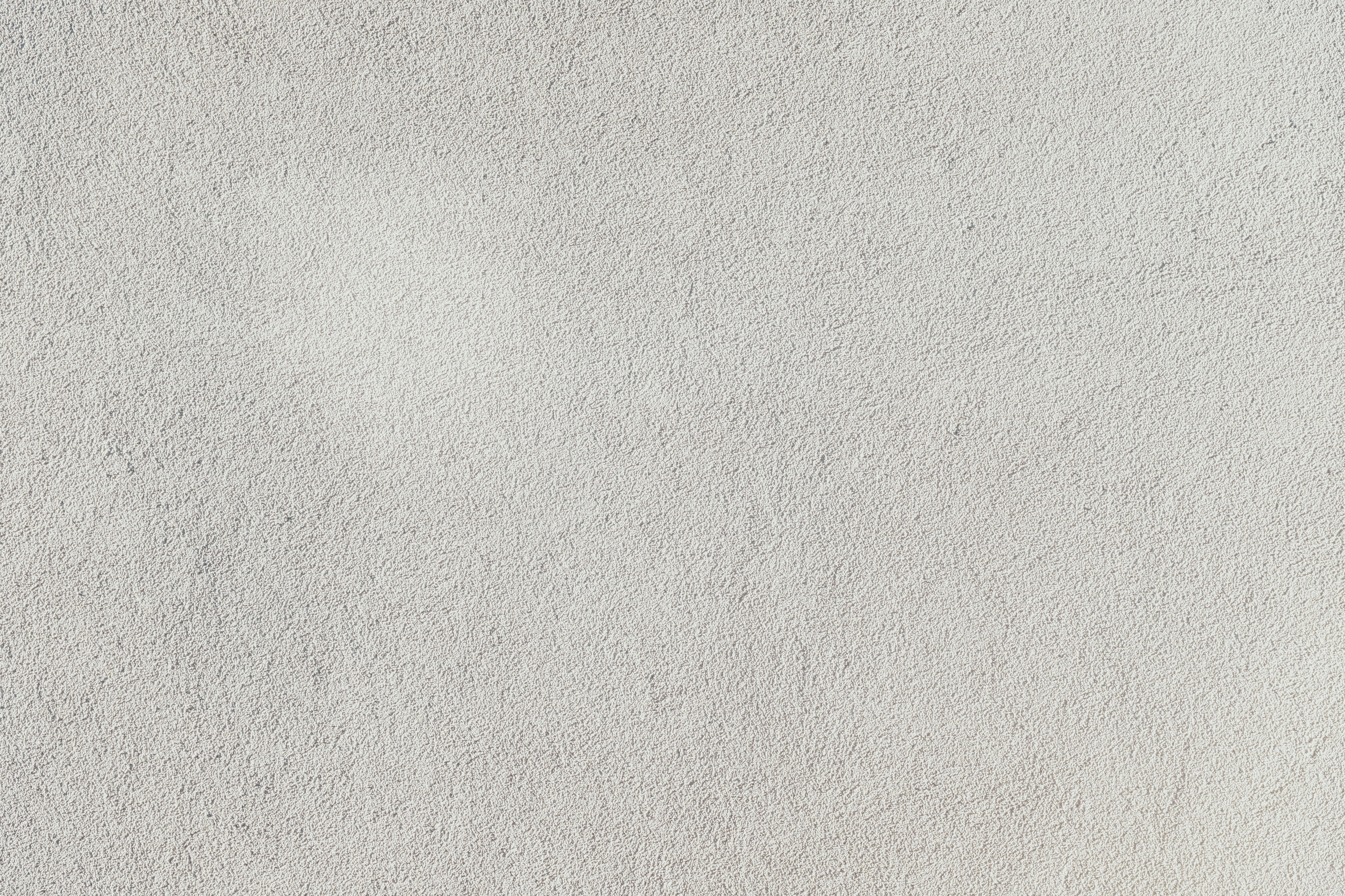 smooth light gray stucco wall, subtle texture, soft natural lighting, 5K Desktop Wallpaper