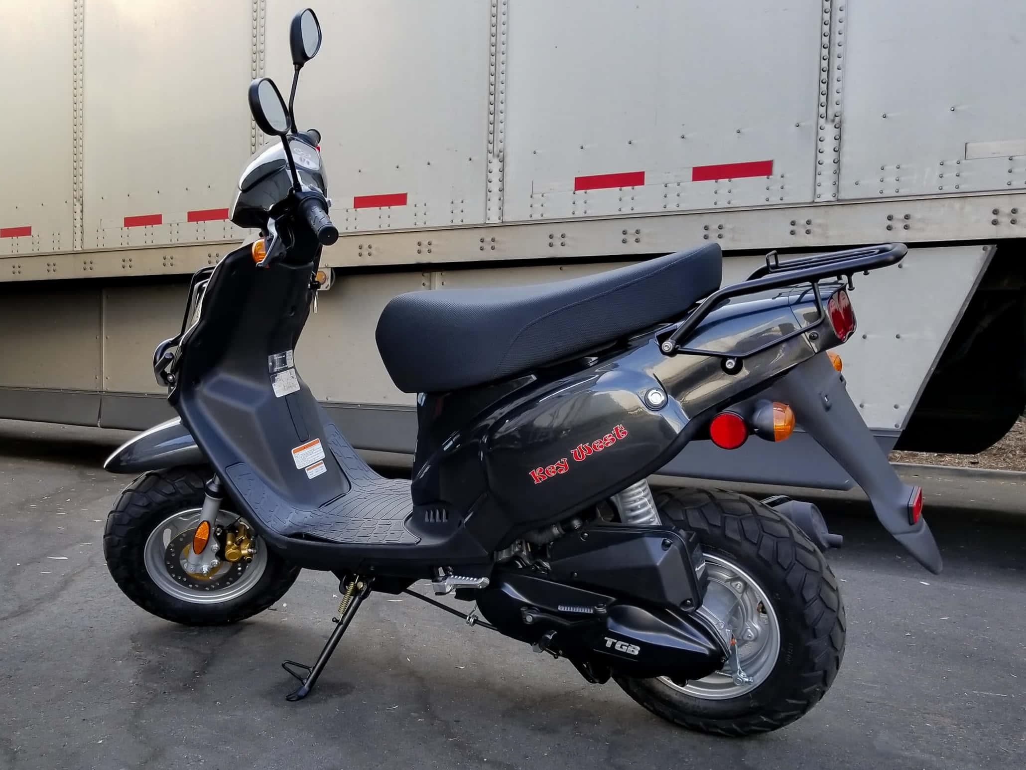 TGB Motorcycle, sleek black scooter, red accents, Full HD Desktop Wallpaper