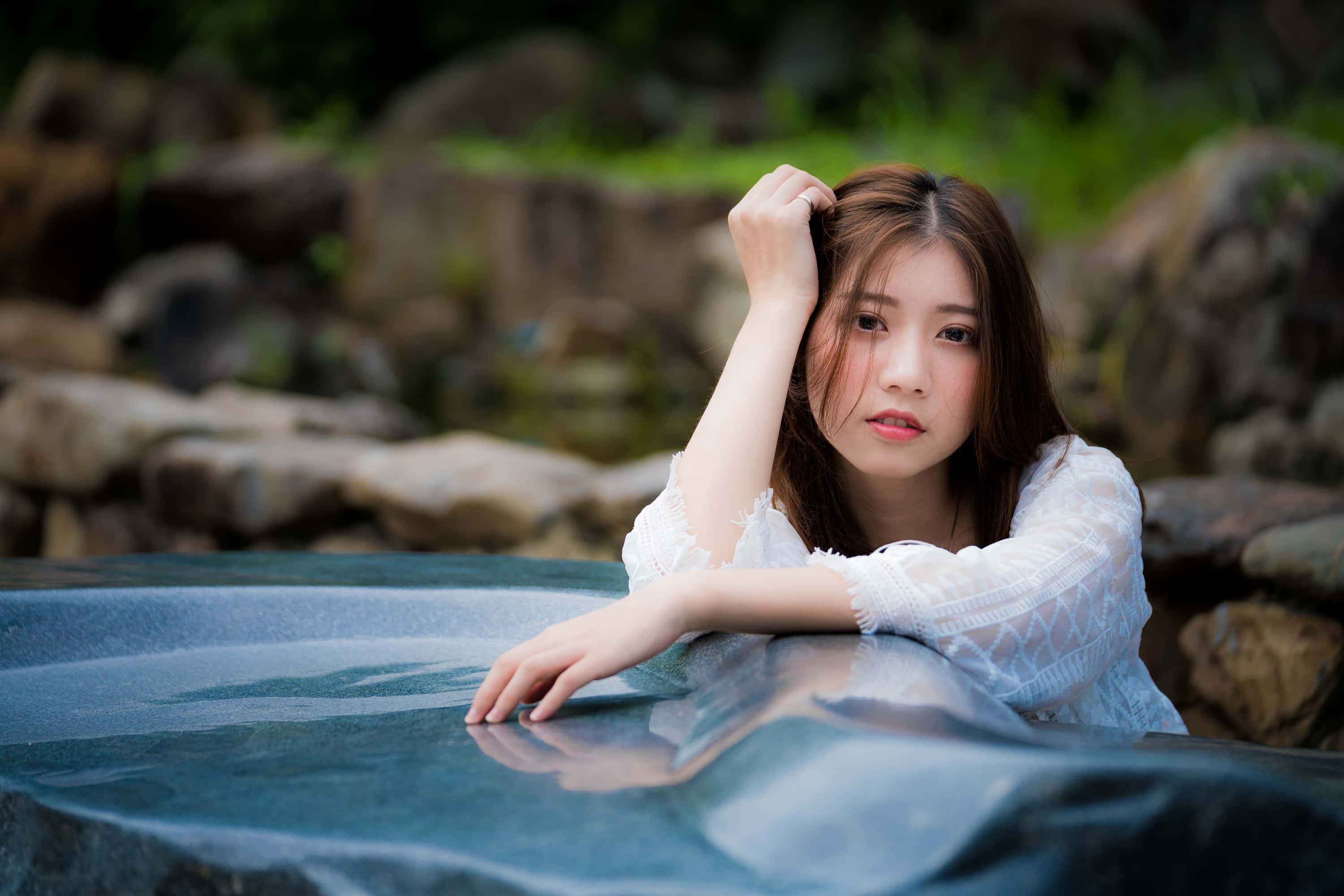 Thai Girl, white lace top, reflective pool, 2K Desktop Wallpaper