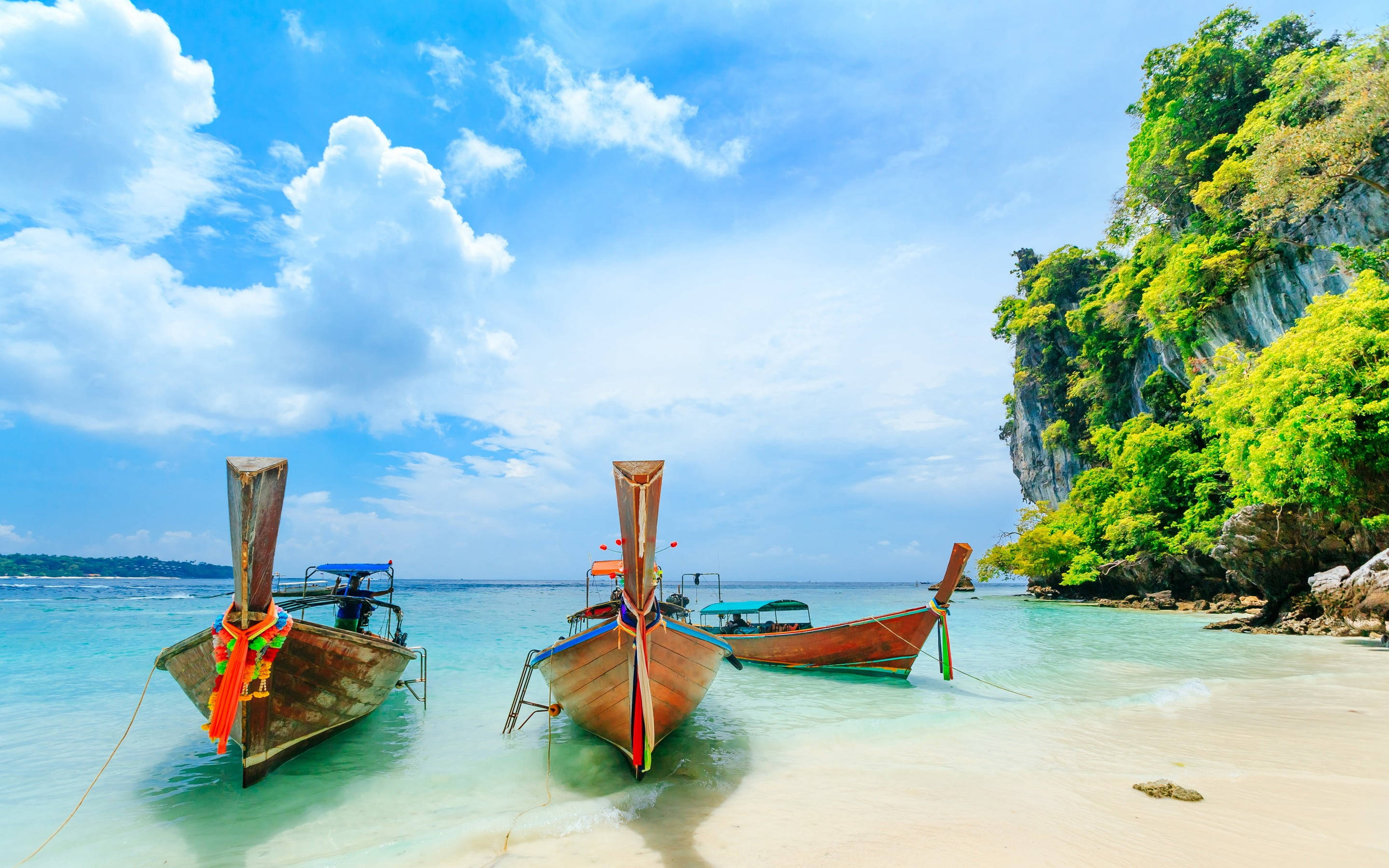three traditional longtail boats, pristine white sand beach, turquoise waters, 2K Desktop Wallpaper