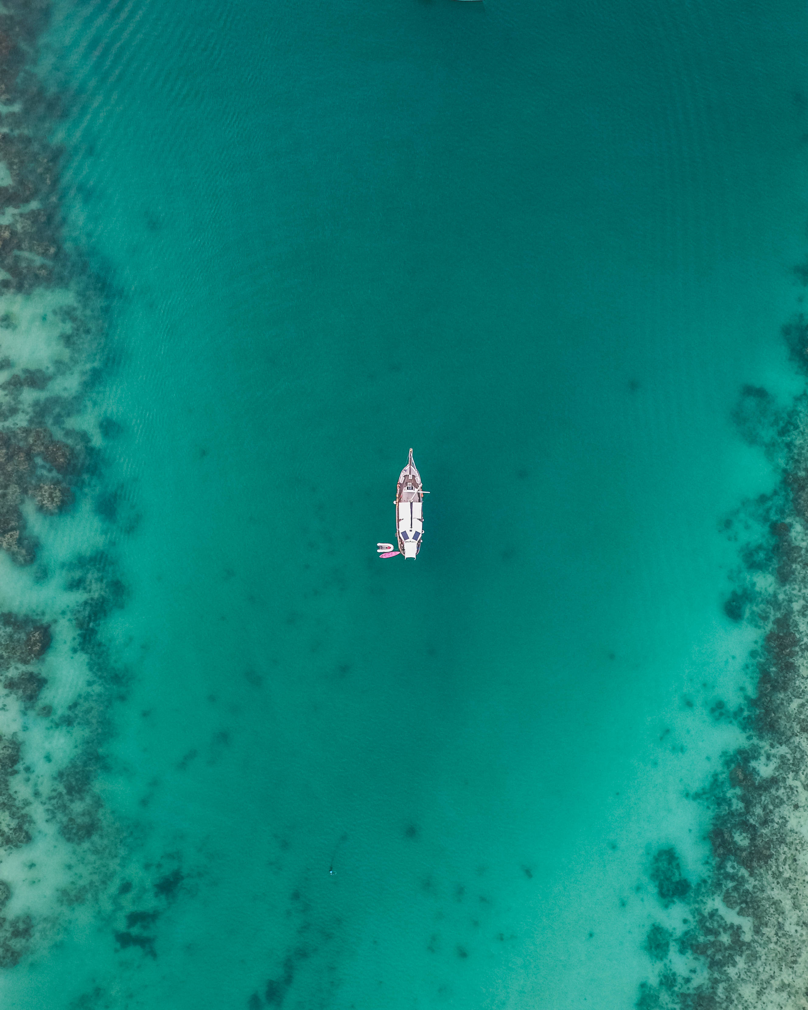 aerial view, paddleboarder, vibrant turquoise waters, 2K Phone Wallpaper