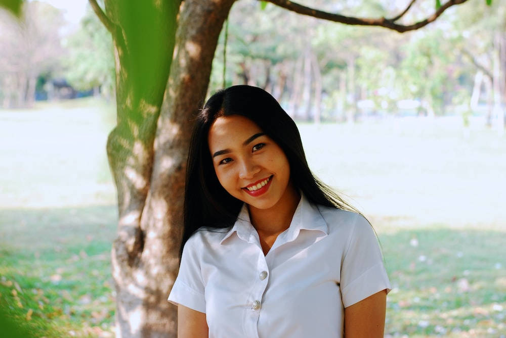Thailand Woman, white uniform, sunlit park, SD Desktop Wallpaper
