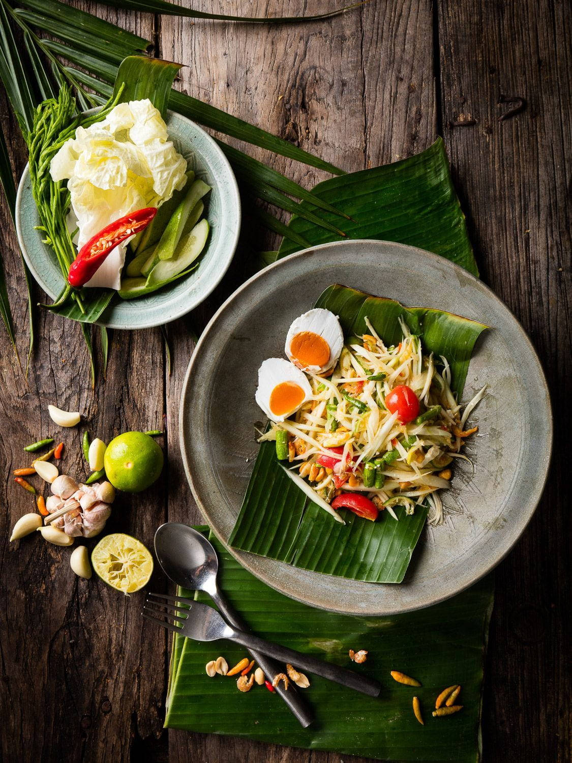 Thai papaya salad, banana leaves, rustic wooden table, HD Phone Wallpaper