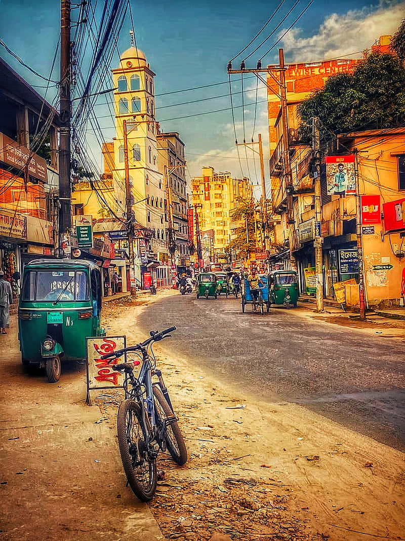 green auto-rickshaws, parked bicycle, golden hour, SD Phone Wallpaper