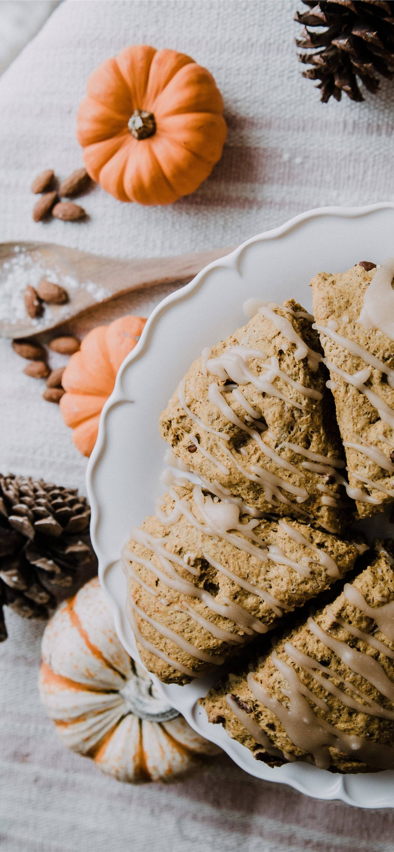 Pumpkin scones, cream drizzle, white plate, 2K Phone Wallpaper