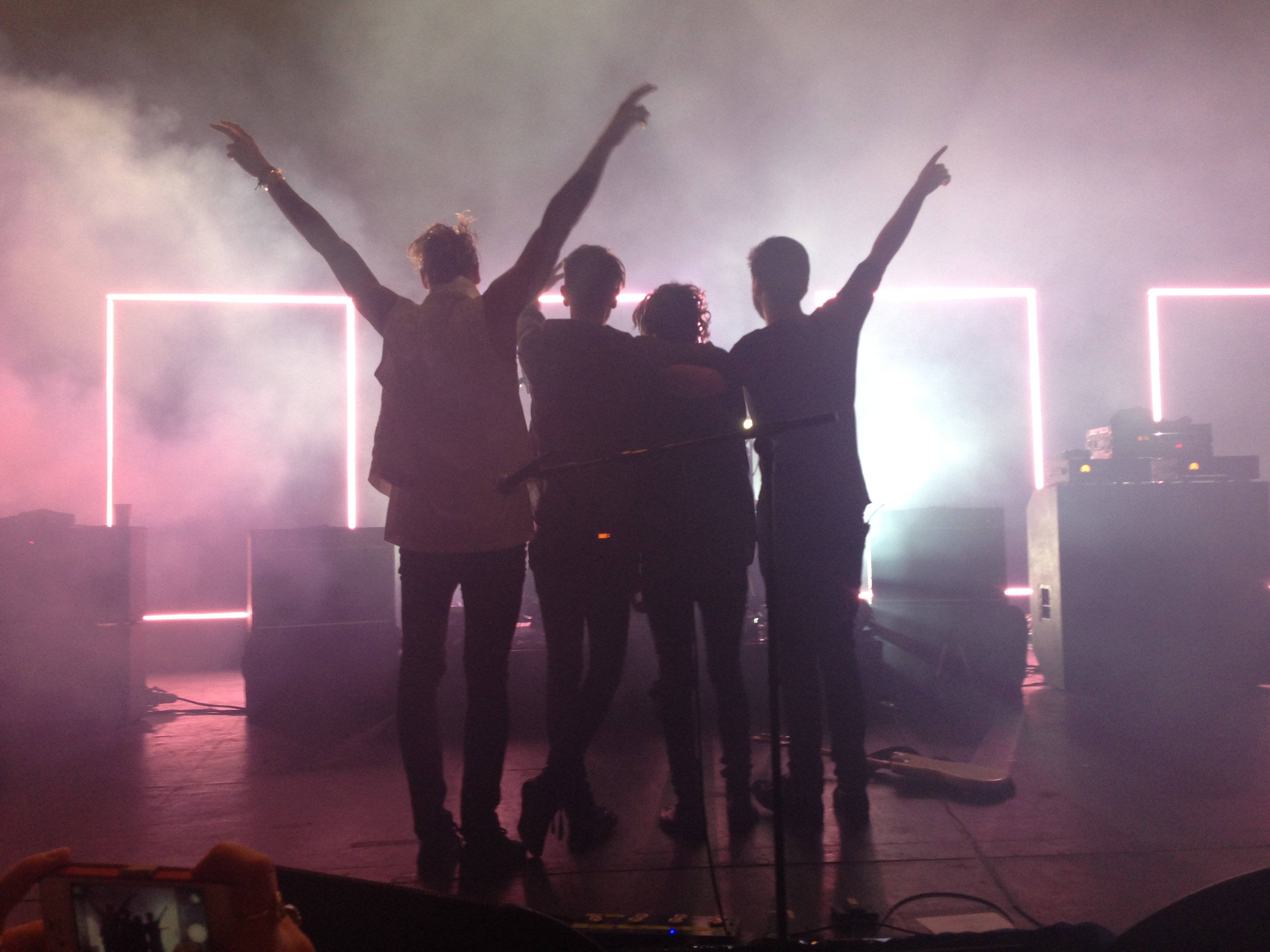 The 1975, smoky stage, glowing pink neon squares, 2K Desktop Wallpaper