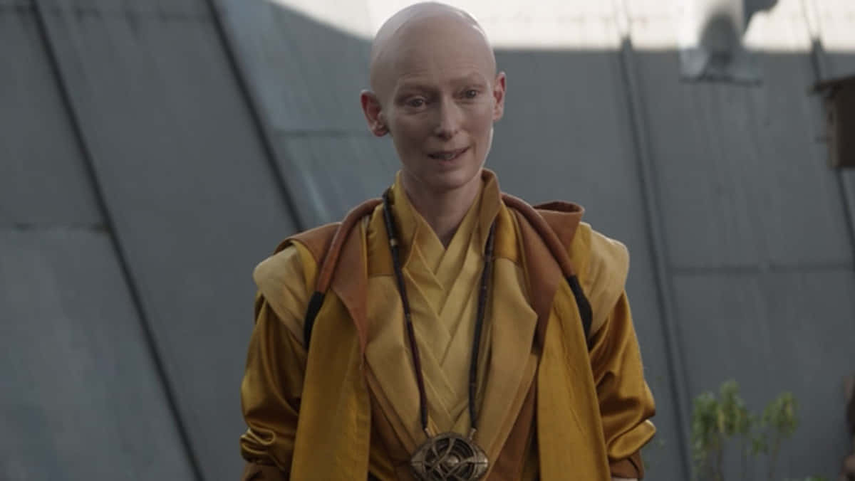 Ancient One, yellow and brown robe, circular pendant, SD Desktop Wallpaper
