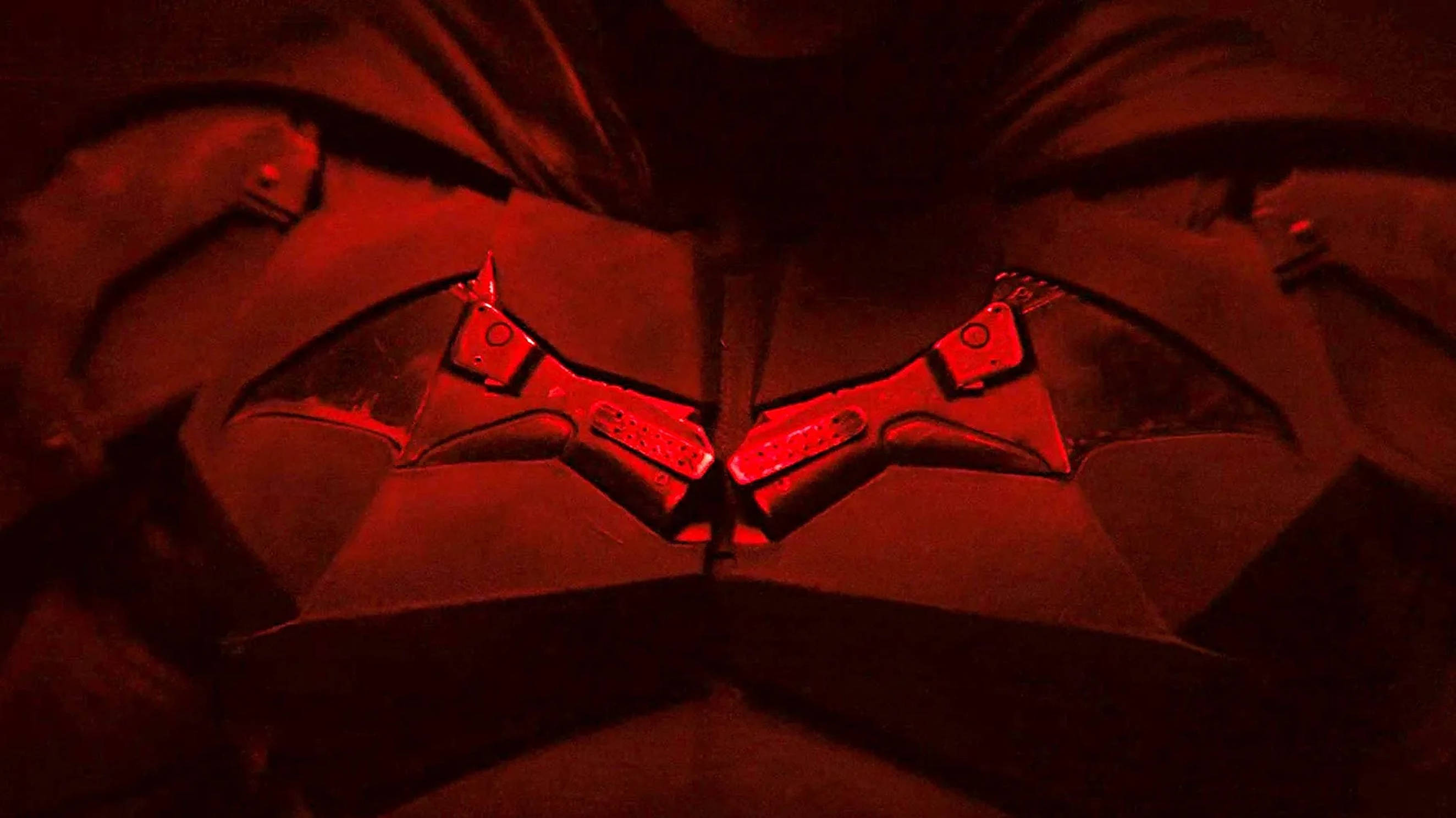 The Batman 2022, glowing red bat symbol, dark armored chest, 2K Desktop Wallpaper