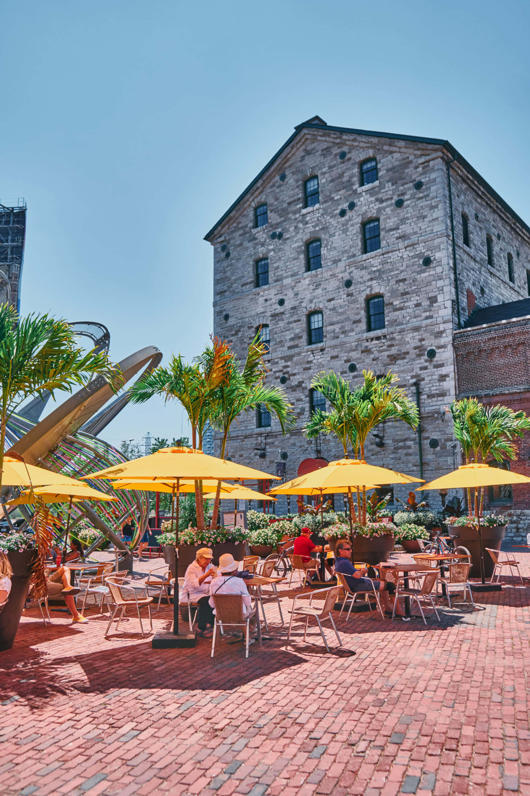Distillery District, red brick patio, historic stone building, 2K Phone Wallpaper