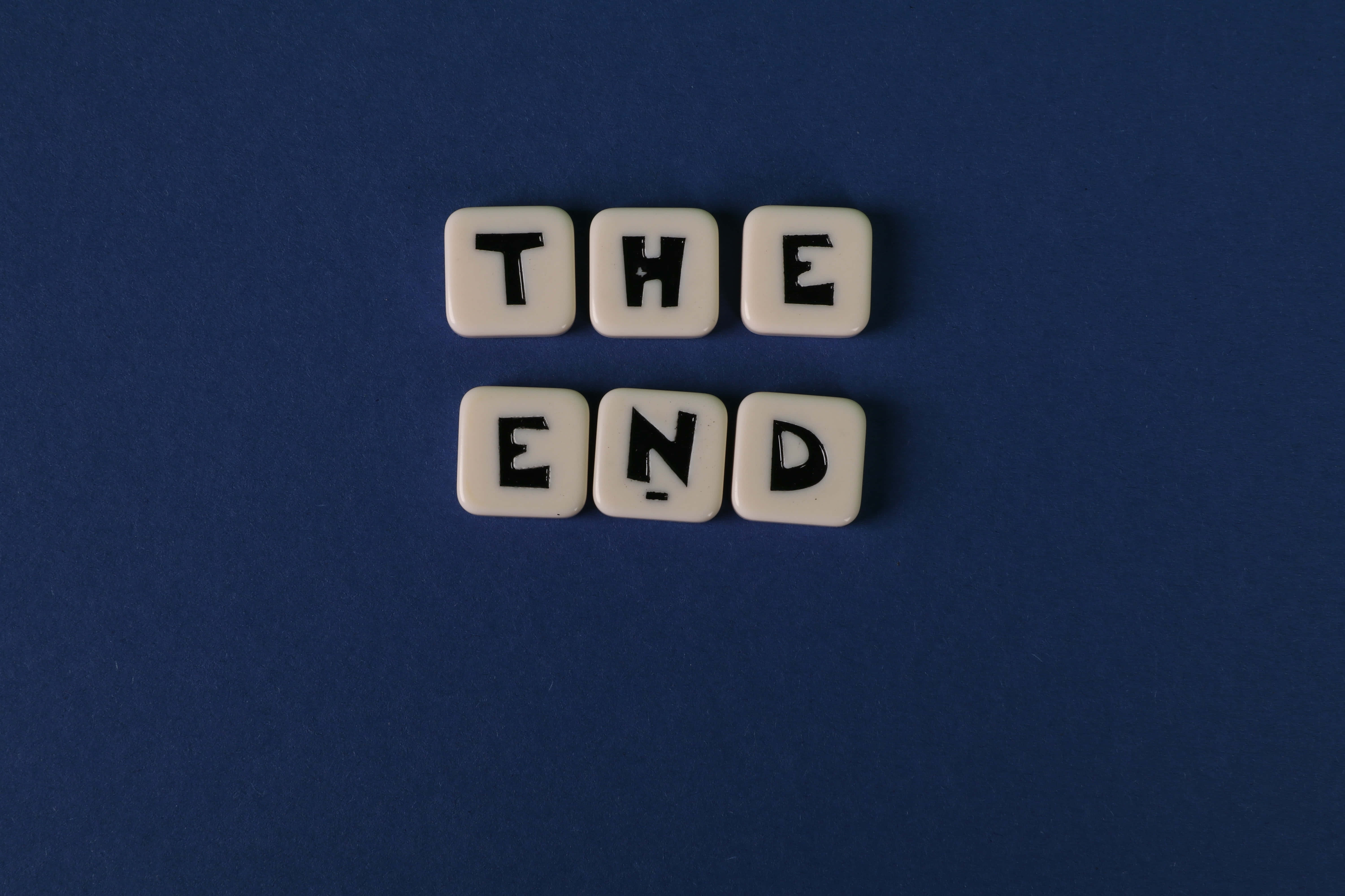 THE END, white letter tiles, bold black font, 5K Desktop Wallpaper