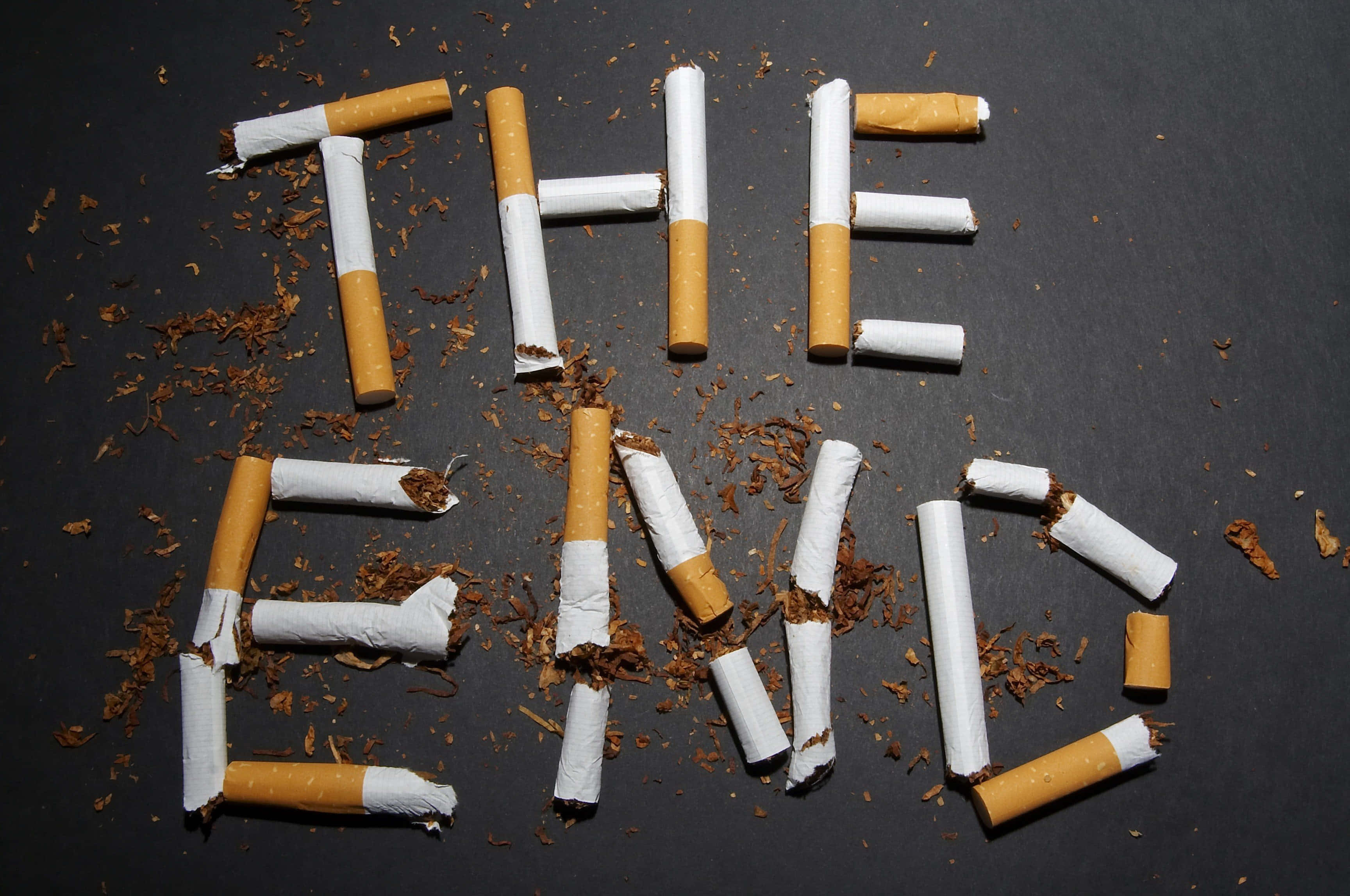 THE END, cigarette butts, black background, 2K Desktop Wallpaper