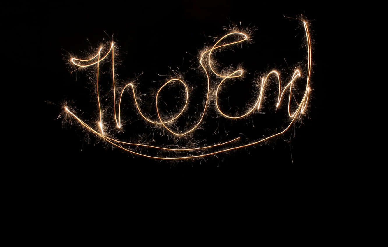 The End, glowing golden sparkler trails, pure black background, HD Desktop Wallpaper