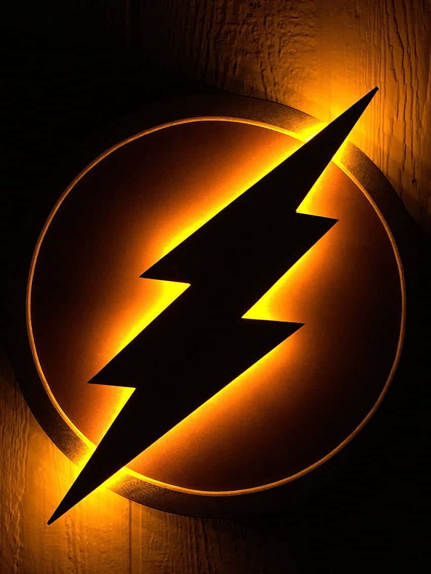 The Flash Logo, glowing yellow lightning bolt, dark wooden wall, SD Phone Wallpaper