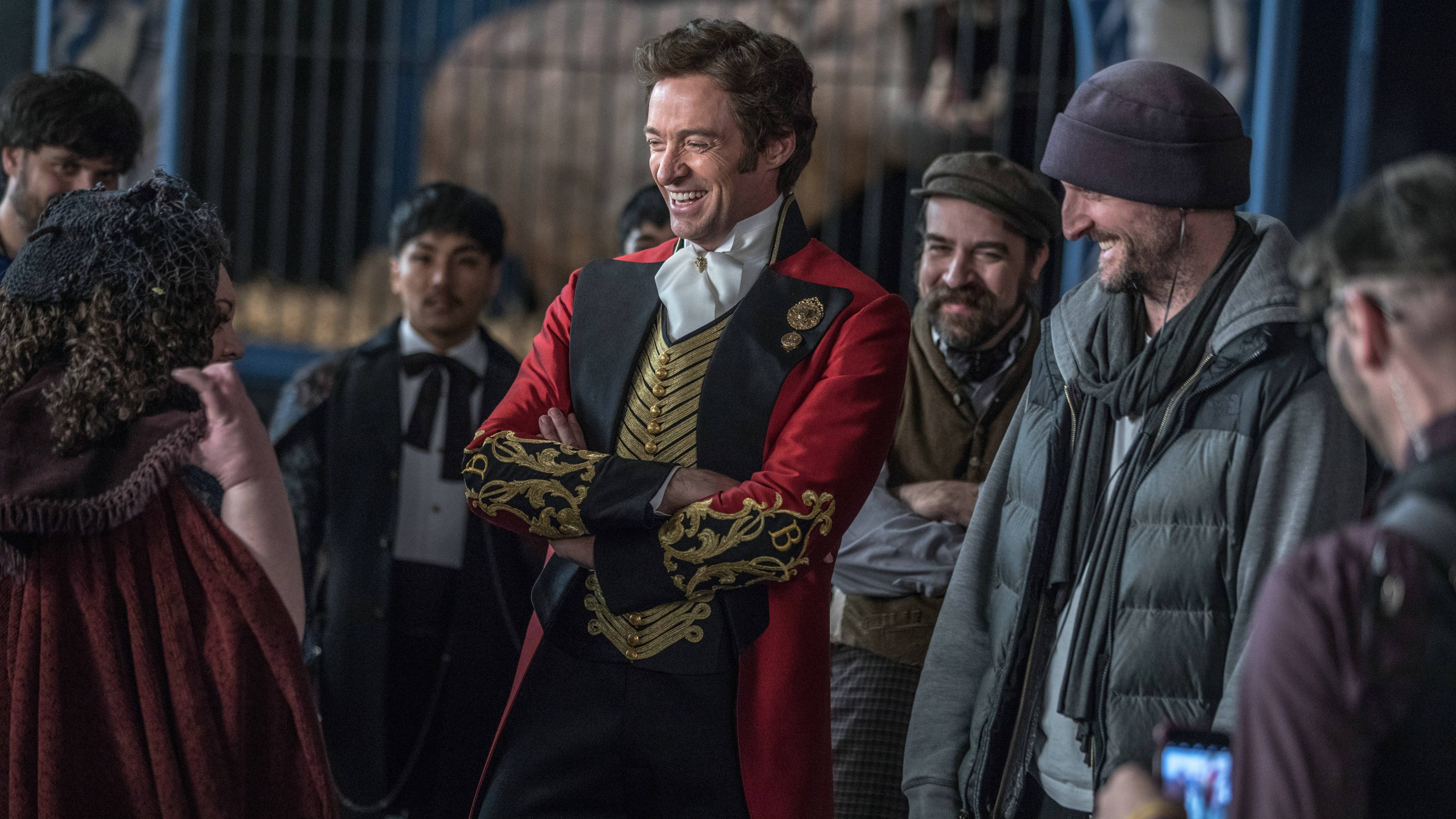 The Greatest Showman, red and gold theatrical costume, backstage setting, 4K Desktop Wallpaper