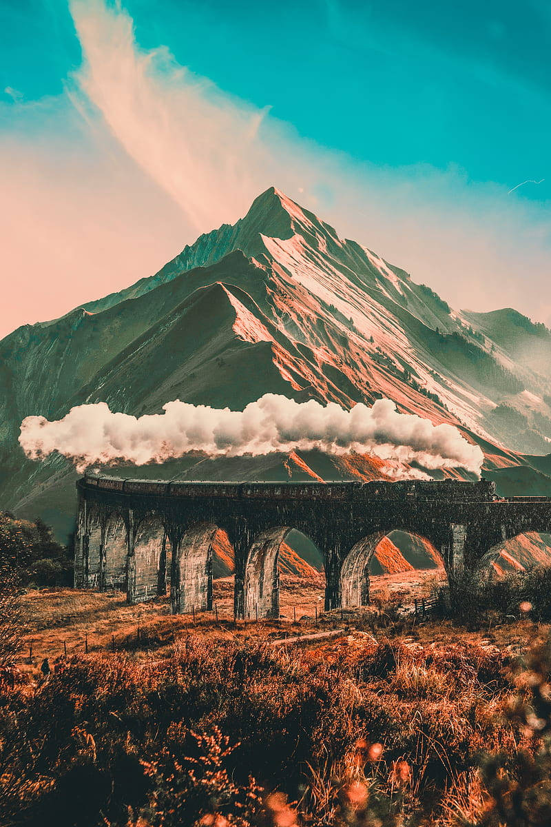 Hogwarts Express, stone viaduct, snow-capped mountain, SD Phone Wallpaper