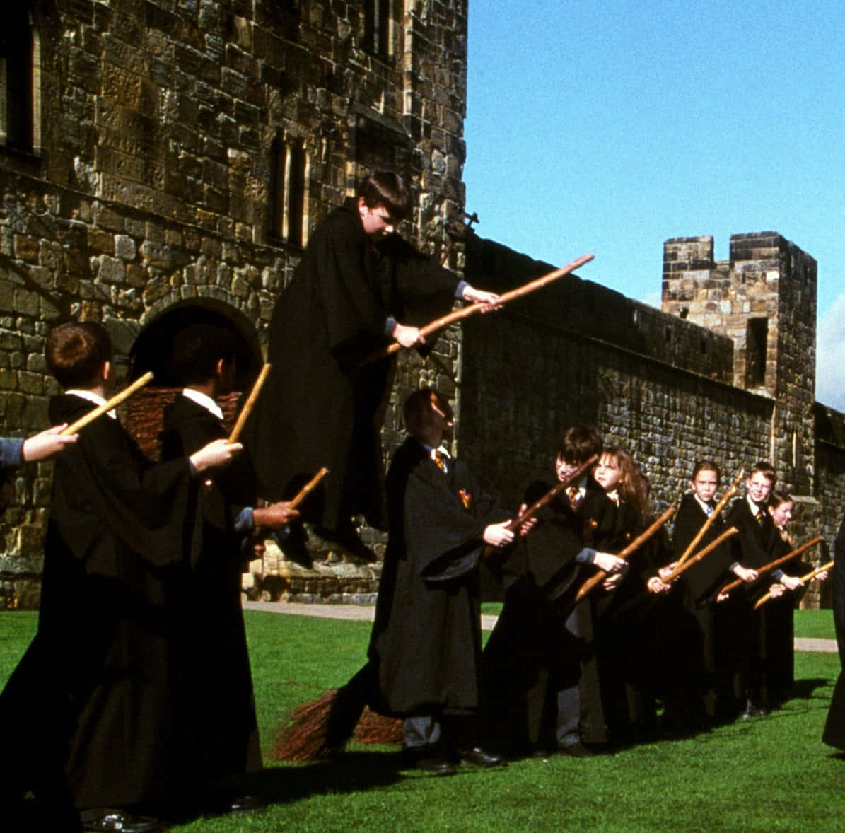 Hogwarts Flying Lessons, black robes, broomsticks, SD Desktop Wallpaper