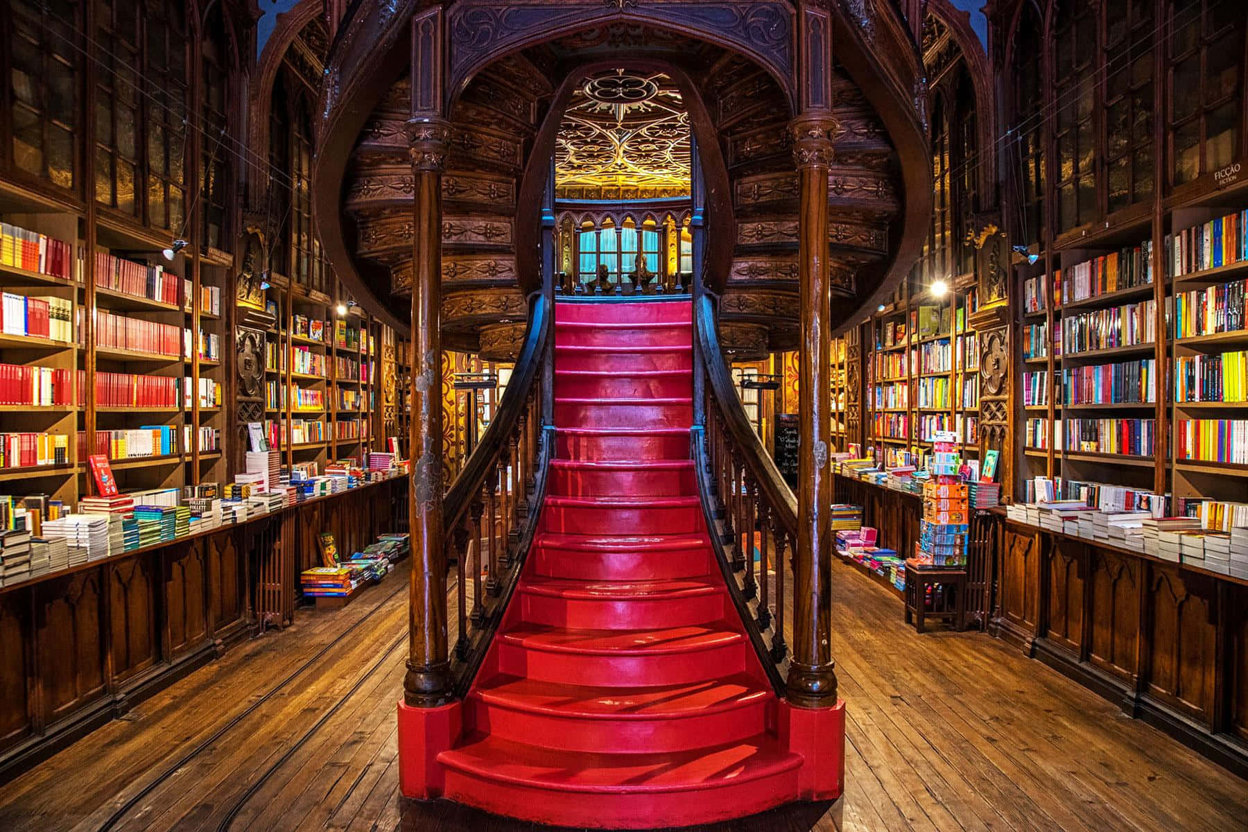 The Hogwarts Library, wooden bookshelves, red carpeted staircase, HD Desktop Wallpaper