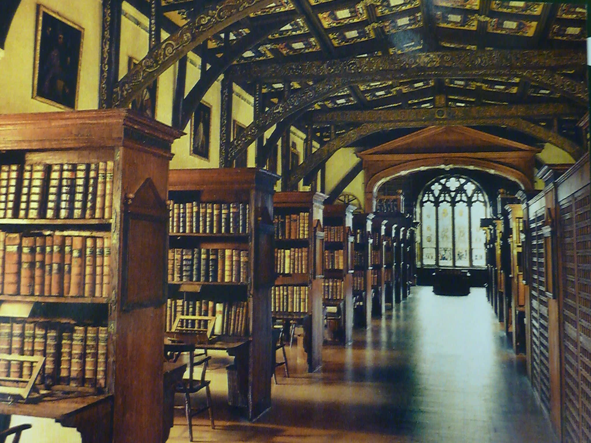 The Hogwarts Library, wooden bookshelves, ornate beams, Full HD Desktop Wallpaper