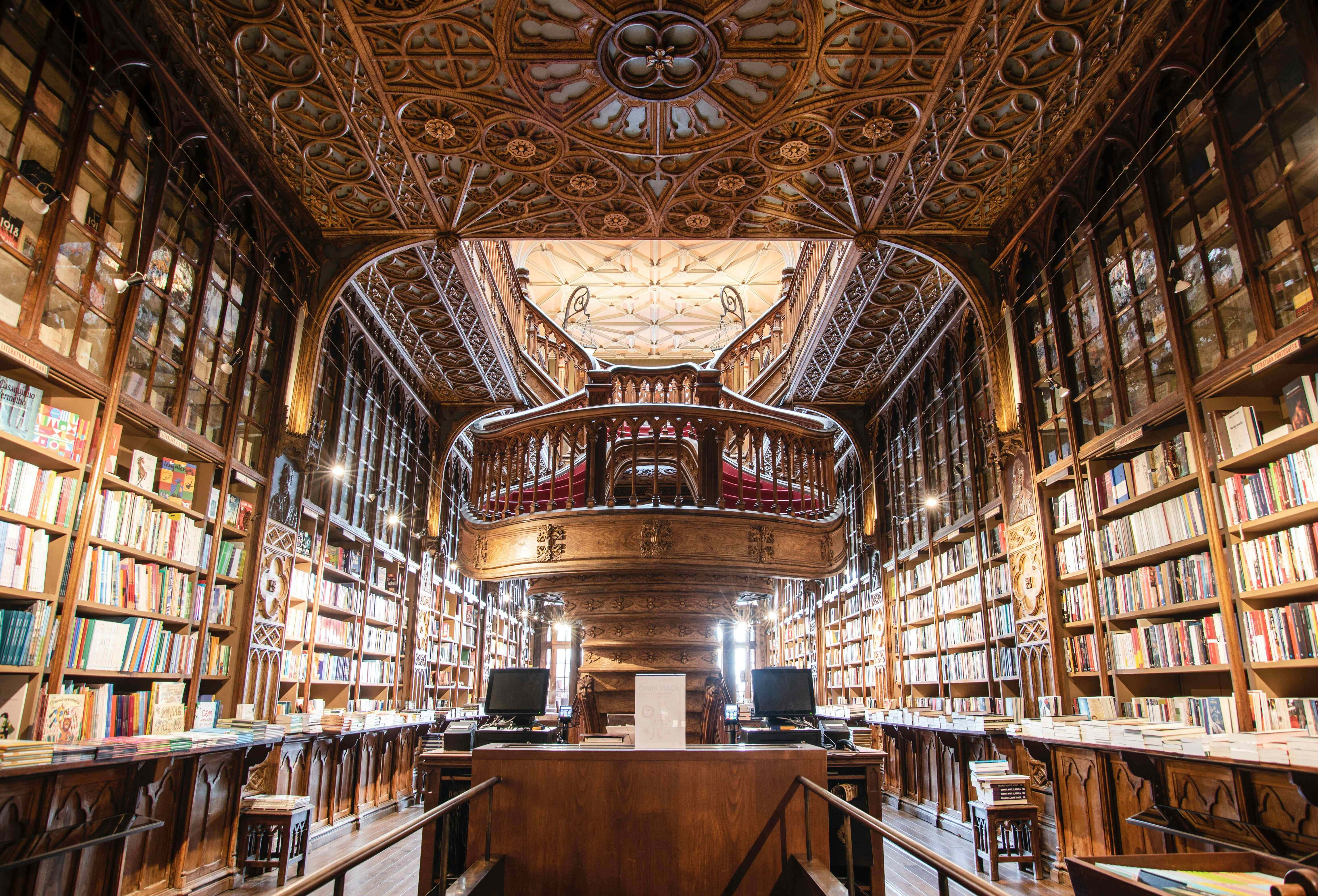The Hogwarts Library, wooden bookshelves, coffered ceiling, 5K Desktop Wallpaper