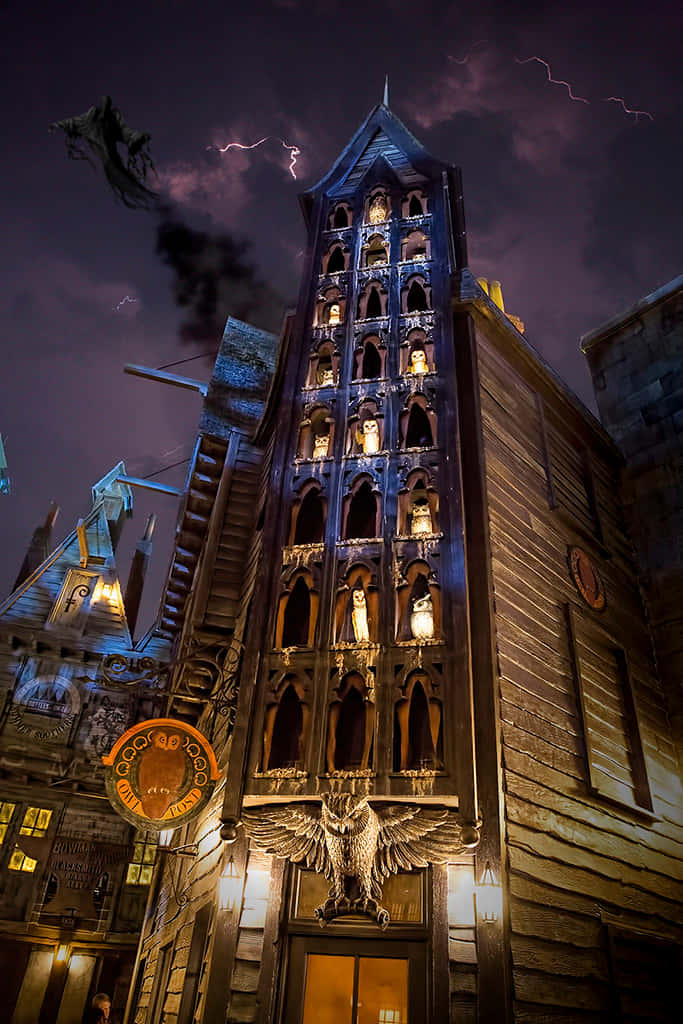 The Hogwarts Owlery, gothic building, glowing windows, SD Phone Wallpaper