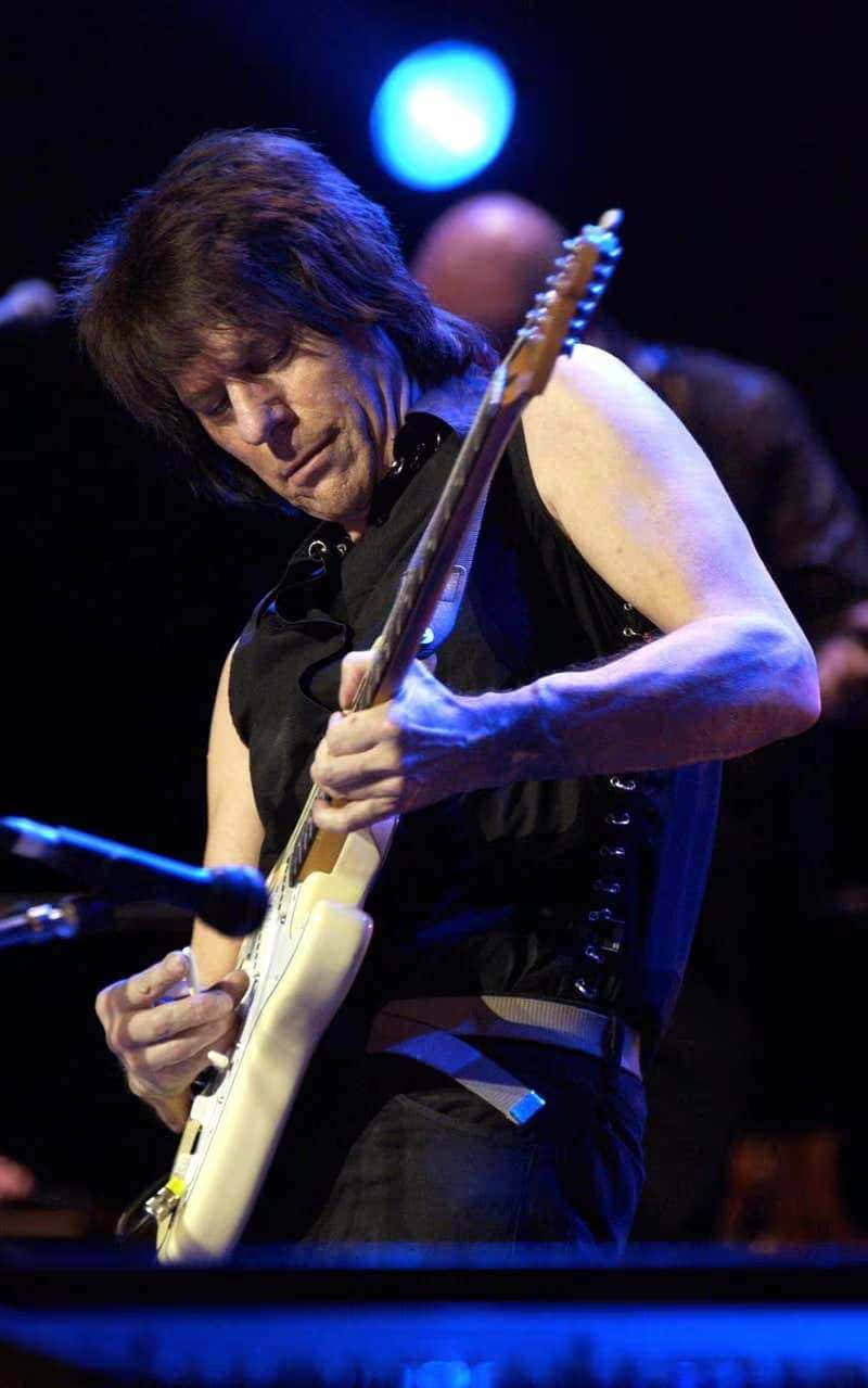 cream electric guitar, vibrant blue stage lights, live concert, SD Phone Wallpaper