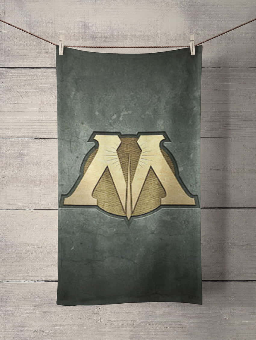 The Ministry of Magic, dark green, gold 'M' logo, SD Phone Wallpaper