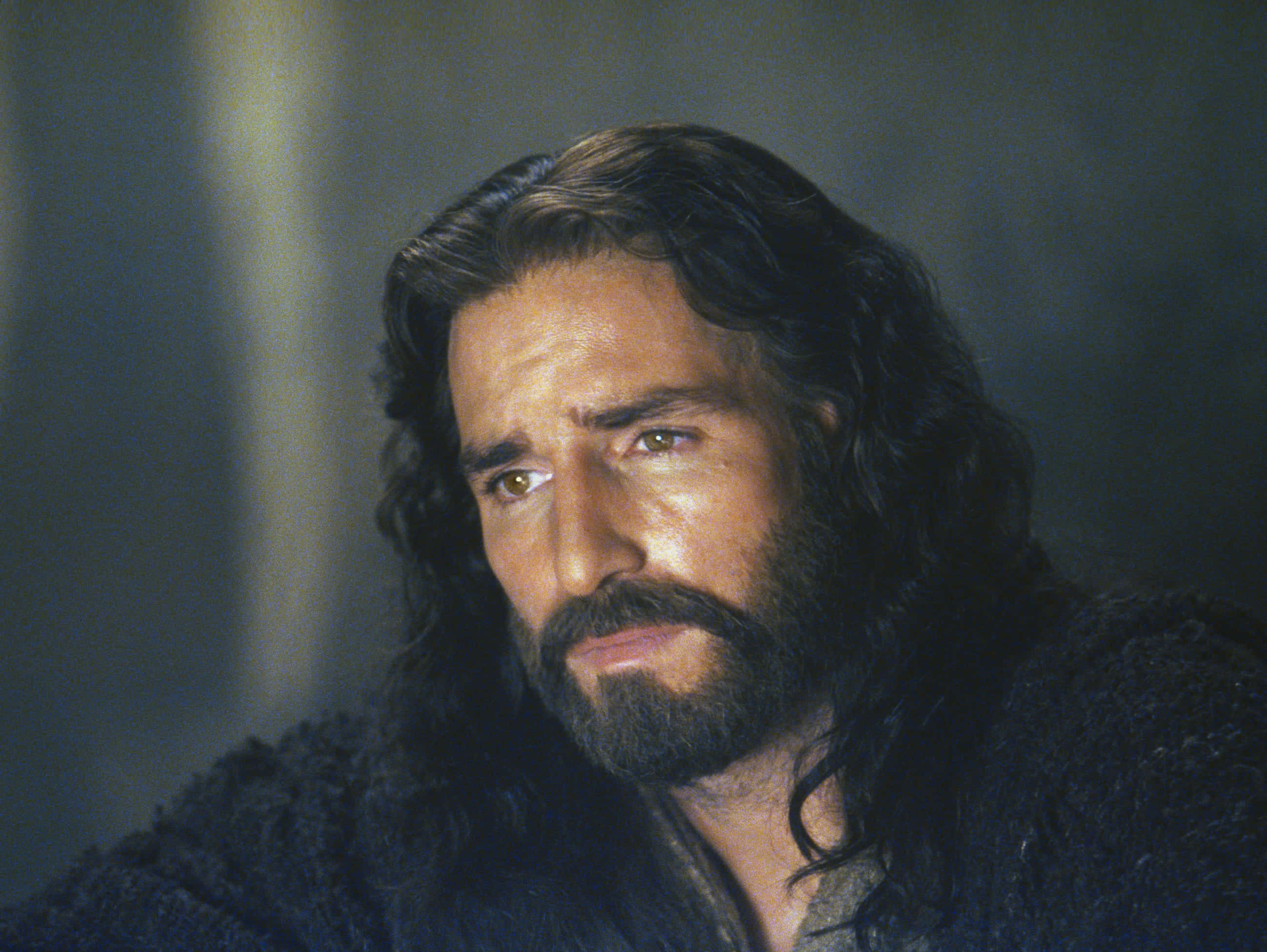 Passion Of Christ, serene expression, long dark wavy hair, 2K Desktop Wallpaper