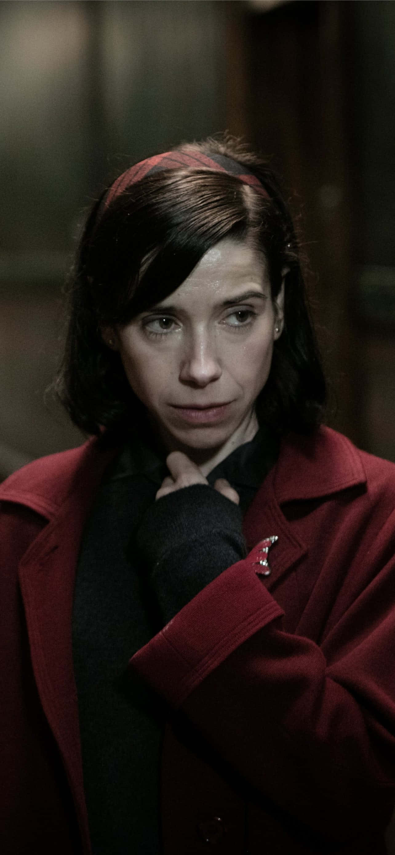 The Shape Of Water, red coat, dimly lit indoor setting, 2K Phone Wallpaper