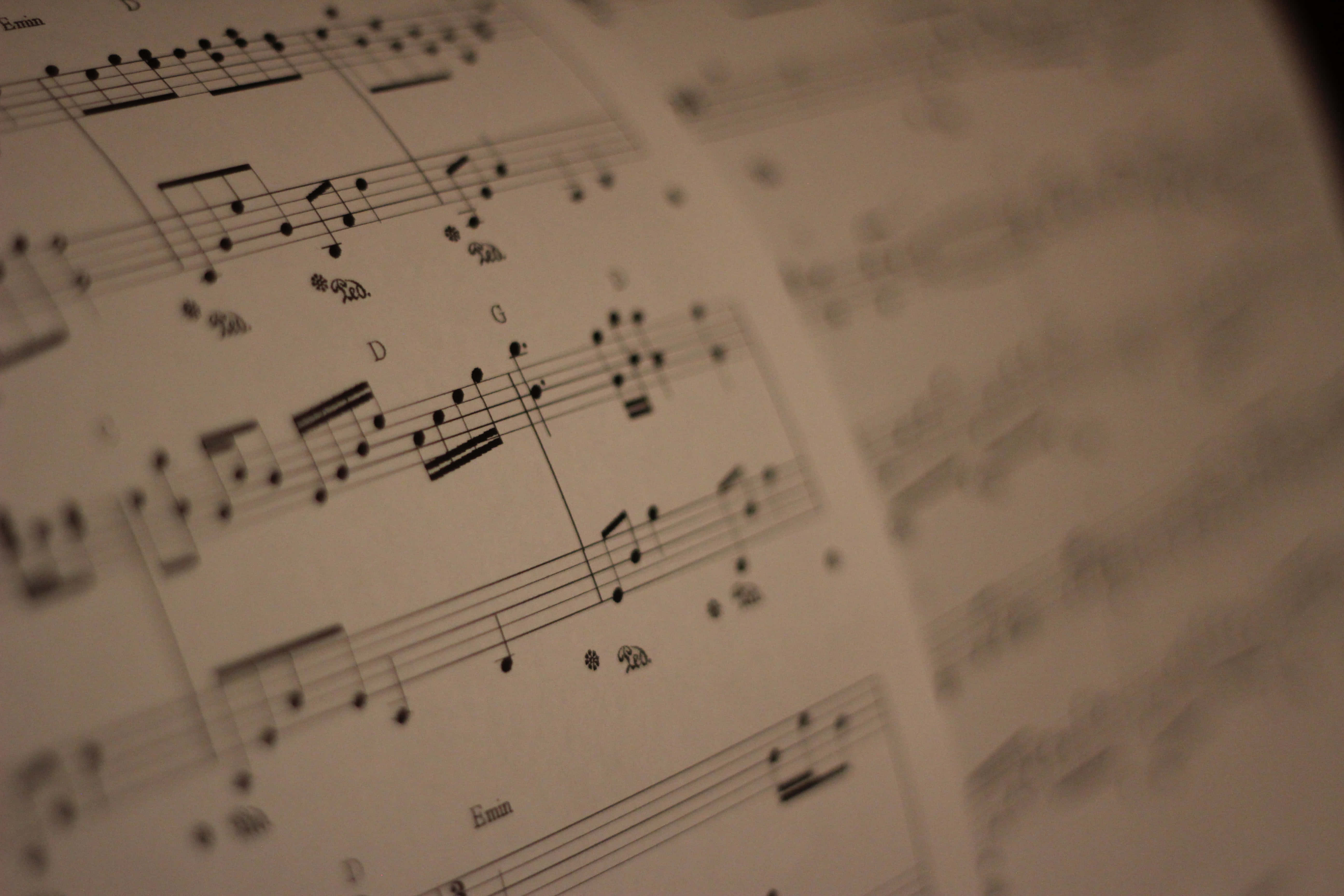 vintage sheet music, warm sepia tones, music notes, 5K Desktop Wallpaper