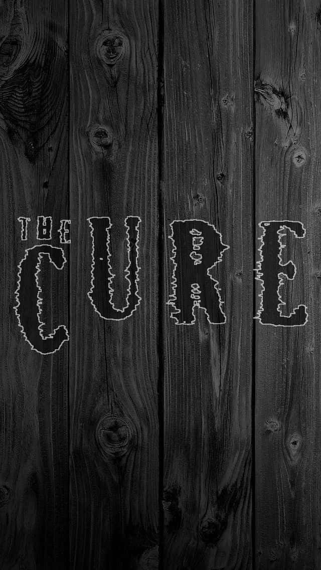 the cure, jagged white letters, dark weathered wooden planks, SD Phone Wallpaper